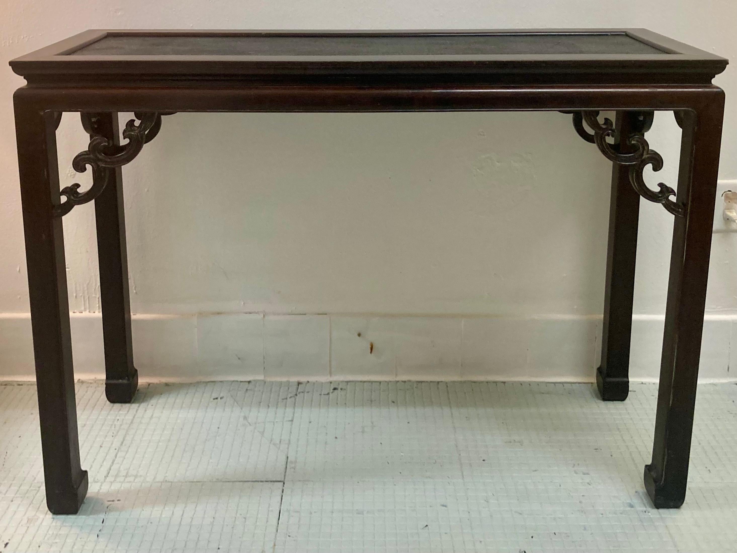 Ming Dynasty Chinese wood console table with taffia top. Beautiful simple carvings and dark original finish. Rare to have the original raffia surface. Very modern form for the Ming Dynasty era.