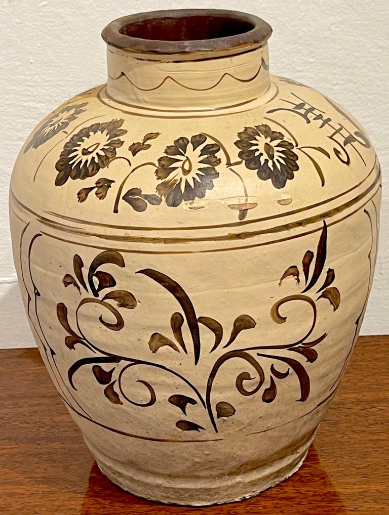 Ming dynasty Cizhou stoneware 'Flowers & Calligraphy ' vase #3*
China, circa 17th century or older
A good example, hand decorated in typical earth-tone Chinese calligraphic palette of florals and Chinese characters.
This vase stands 17-Inches