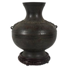 Antique Ming Dynasty Period Cast Bronze Hue Shaped Urn in an Archaist Style