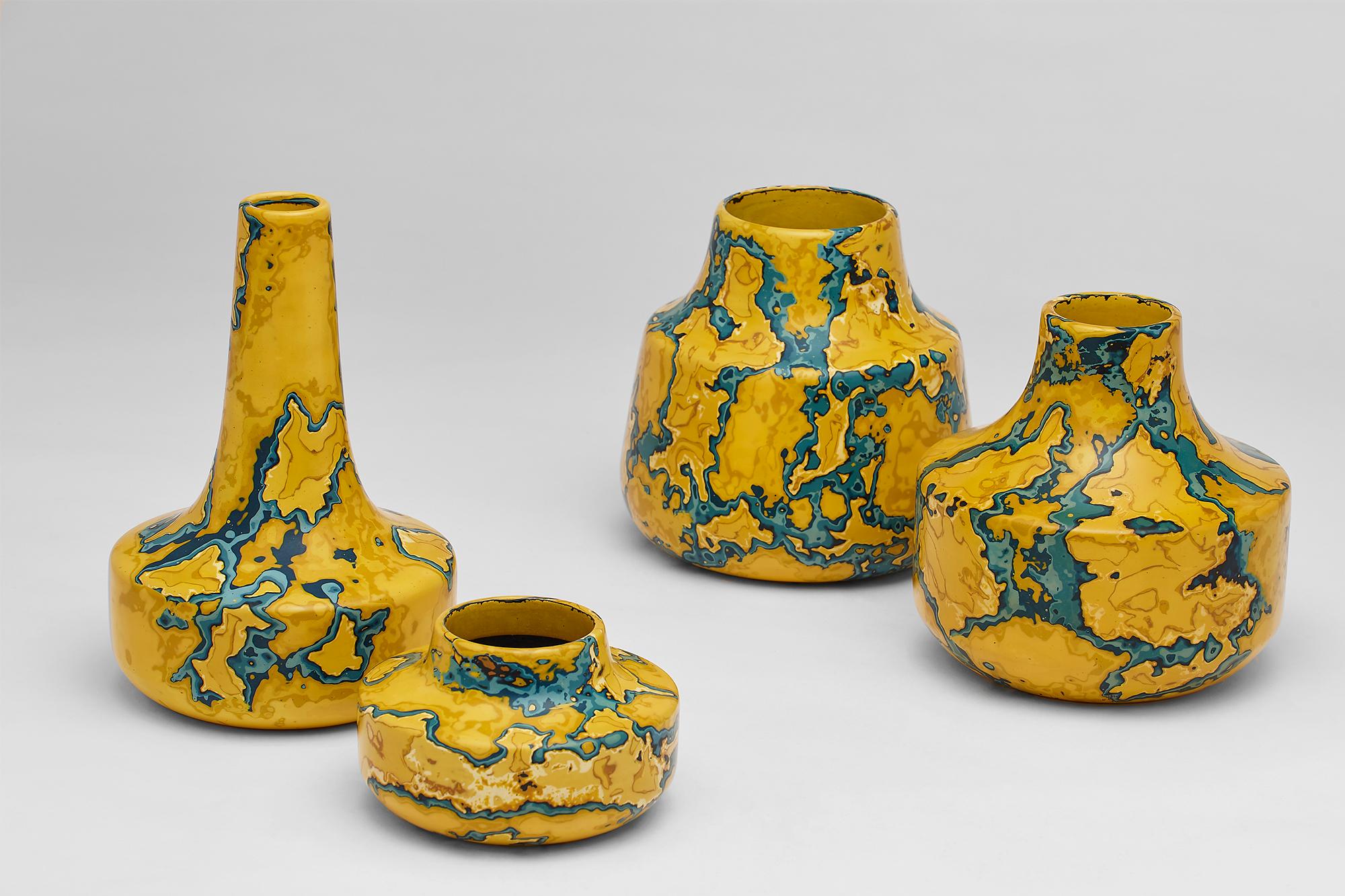 Cast Ming Stone, set of four yellow & blue Jesmonite vessels /vases by Nic Parnell For Sale