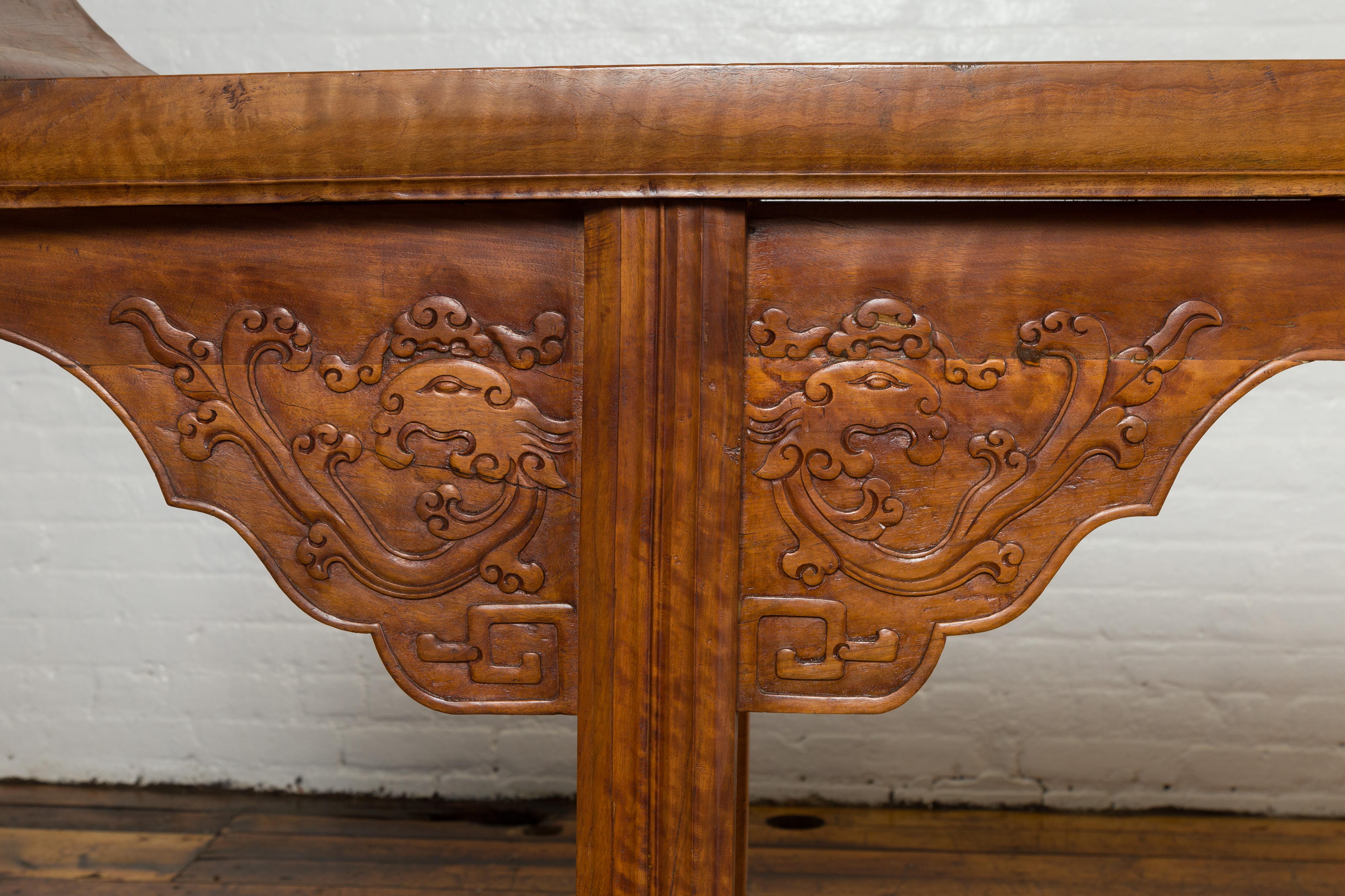 Carved Ming Style Altar Table with Everted Flanges, Cloud Motifs and Mythical Creatures For Sale
