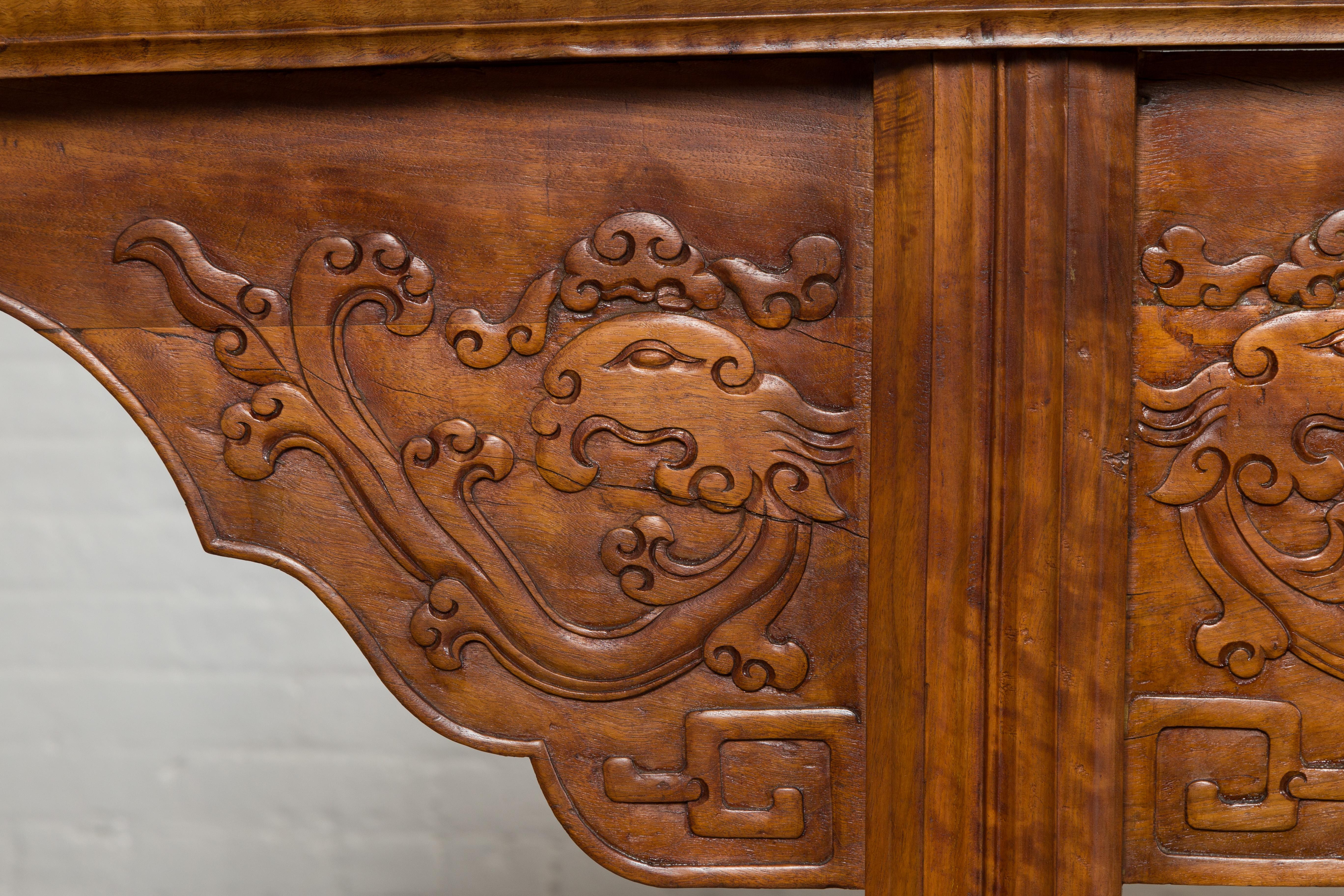 19th Century Ming Style Altar Table with Everted Flanges, Cloud Motifs and Mythical Creatures For Sale