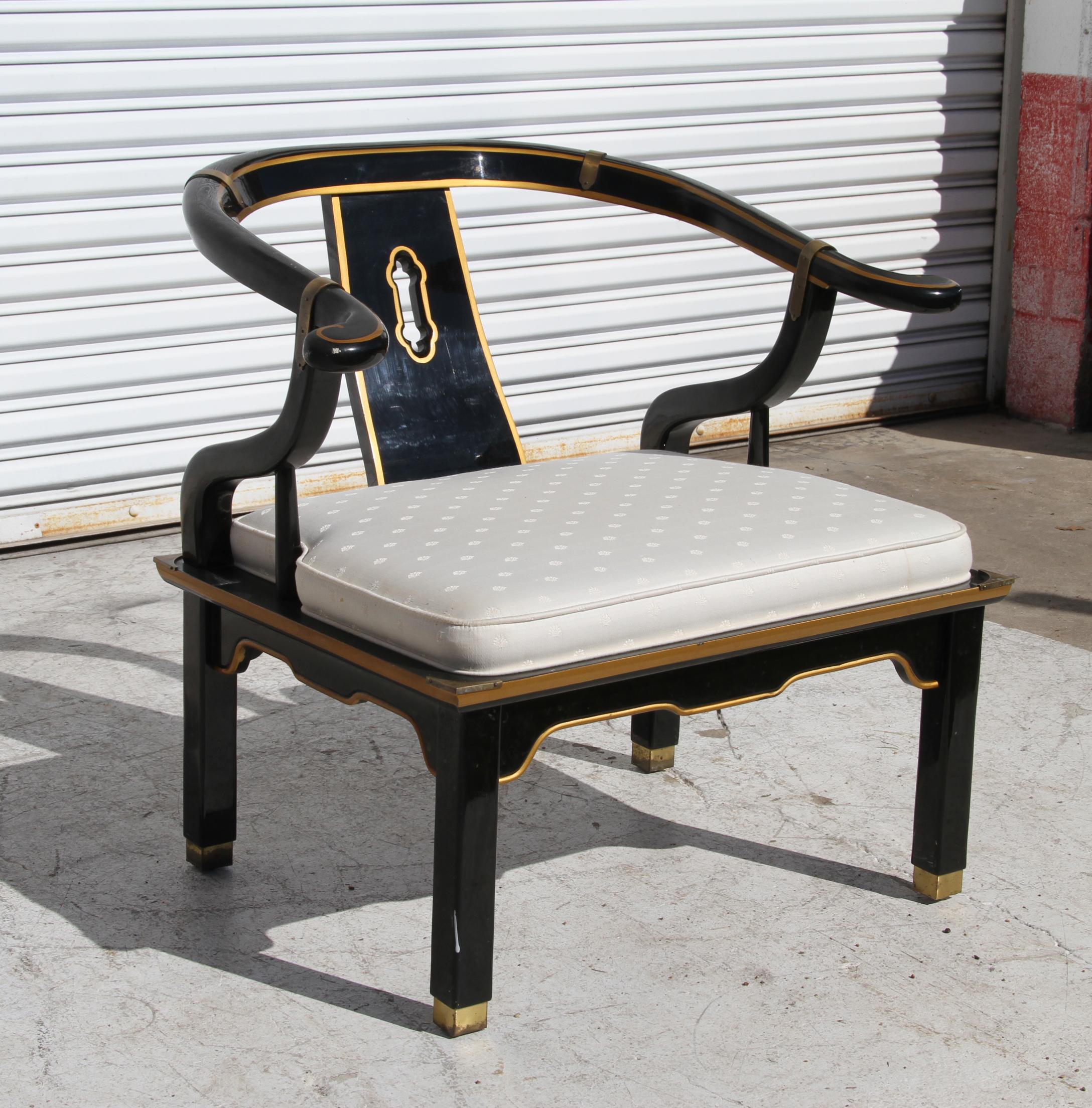 Ming style black lacquer & brass low chair after James Mont.

Ming style yoke back black lacquered low chair with square brass sabots in the style of James Mont. circa, midcentury-1970s.

Vintage Ming style low yoke back chair in the style of James