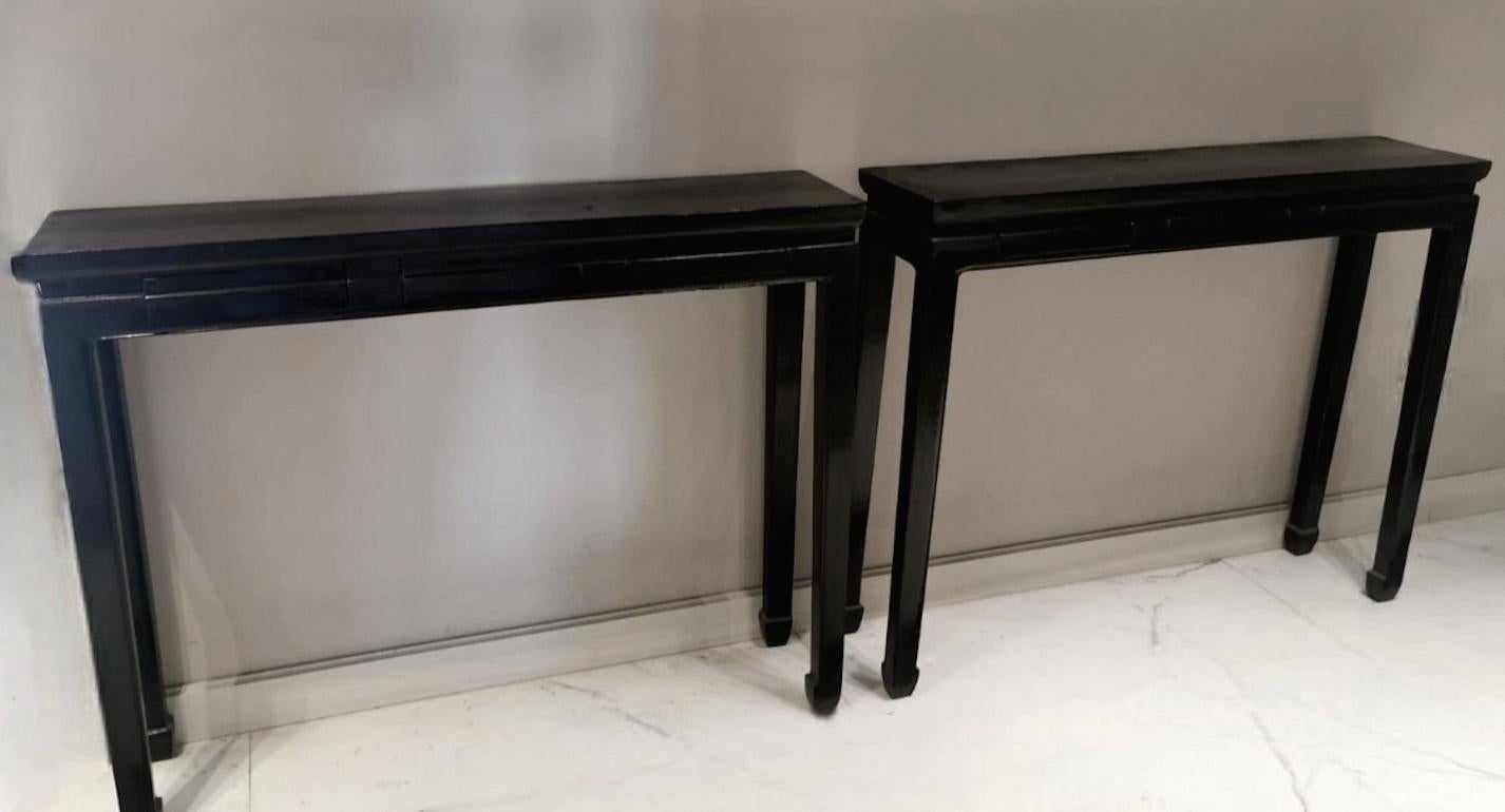 20th Century Ming Style Pair Of Chinese Lacquered Glossy Black Console Tables