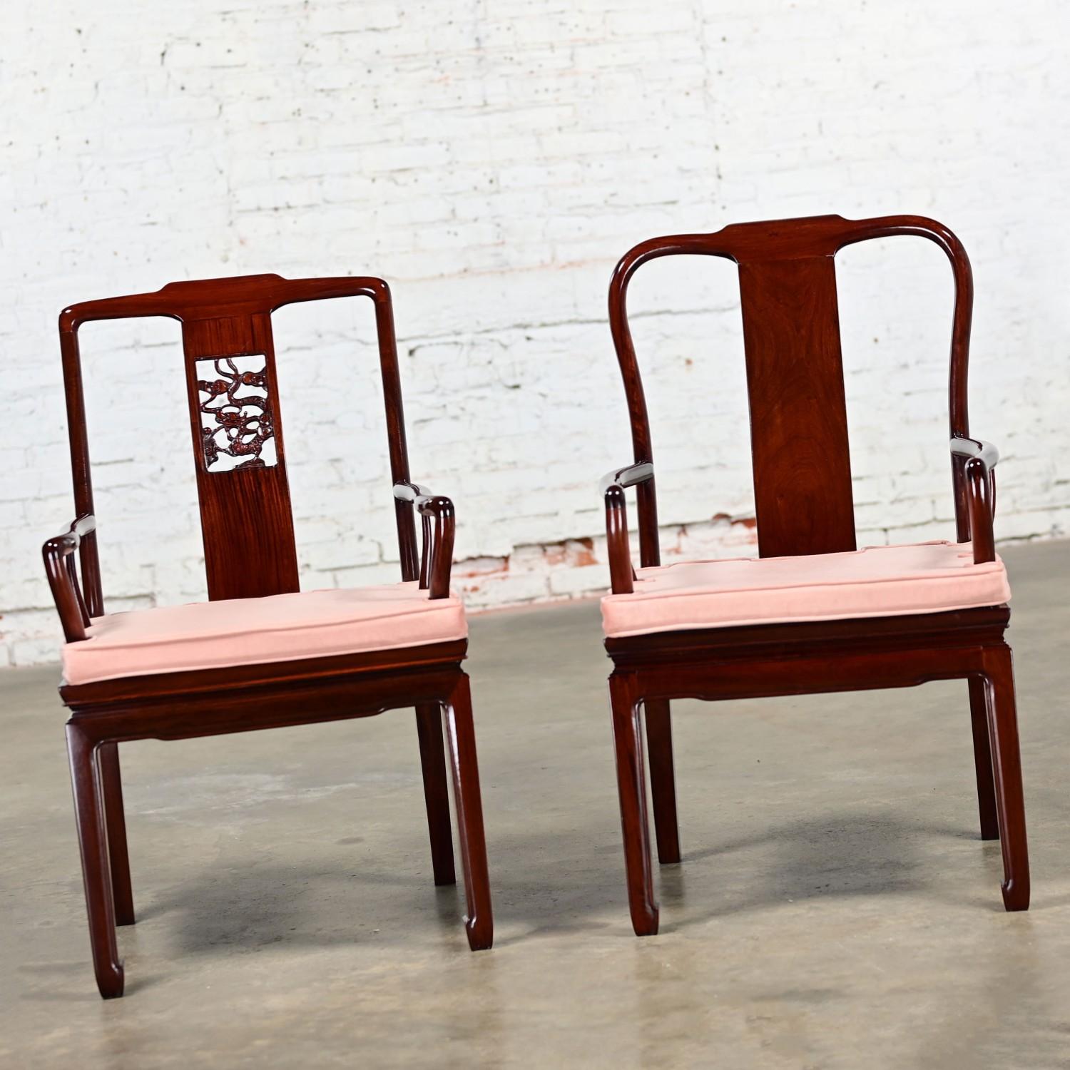 Marvelous vintage Ming style armchairs comprised of rosewood frames & removeable pink velvet seat cushions made in China a pair. Beautiful condition, keeping in mind that these are vintage and not new so will have signs of use and wear even if it