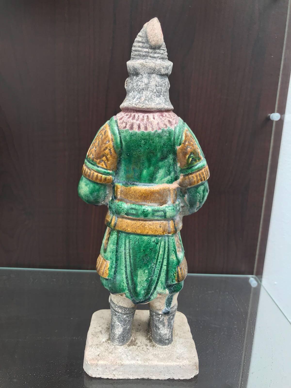 Ming Warrior 24 cms height, wearing Mountain pattern armour and a Manchu helmet with plume, carrying bow. The vast majority of original pigment remaining.
Condition: Very good 
TL tested