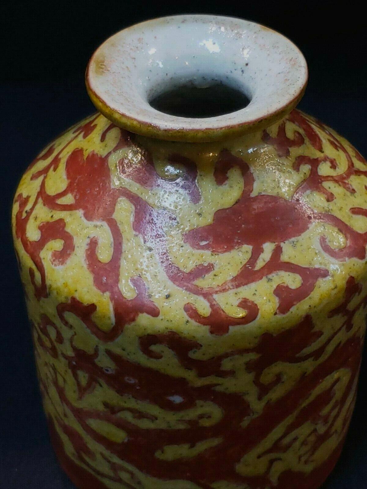 Ming, yellow glaze red dragon ornament pattern porcelain vase/ ?,???????(??)
Item measurement:H: 6 inch approximate W: 4 inch
Material: Yellow glaze porcelain 
Condition:As antique porcelain consider to be perfect condition,shows normal signs of