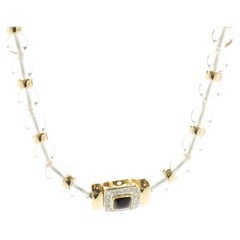 Mings Halskette aus 14 Karat Gelbgold mit Diamanten und Onyx