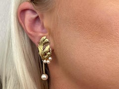 Mings Gold Carved Phoenix Clip on Earrings with Dangly Pearl in 14k