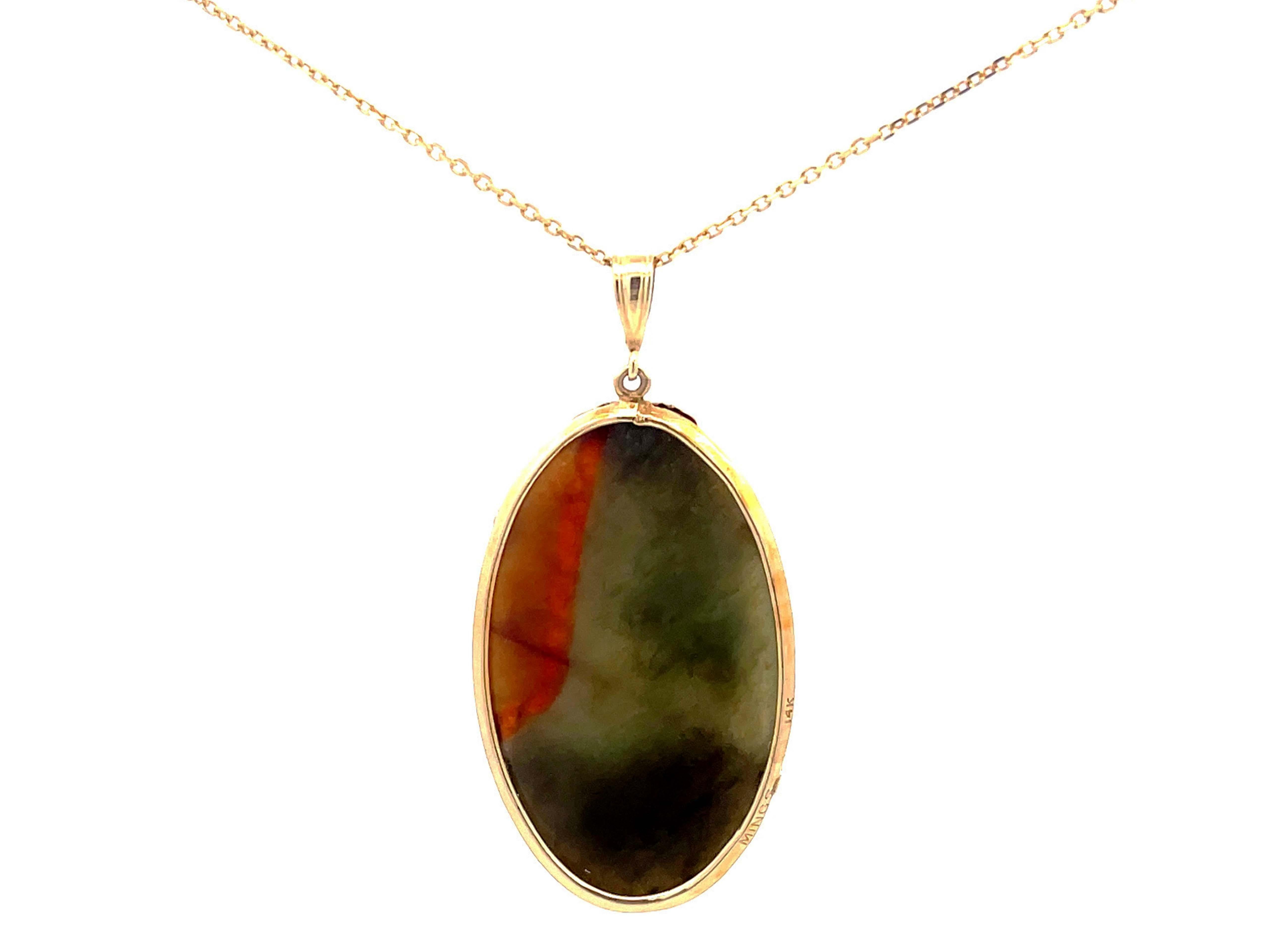 Mings Hawaii Carved Green and Red Oval Jade Pendant and Chain in 14k Yellow Gold In Excellent Condition For Sale In Honolulu, HI