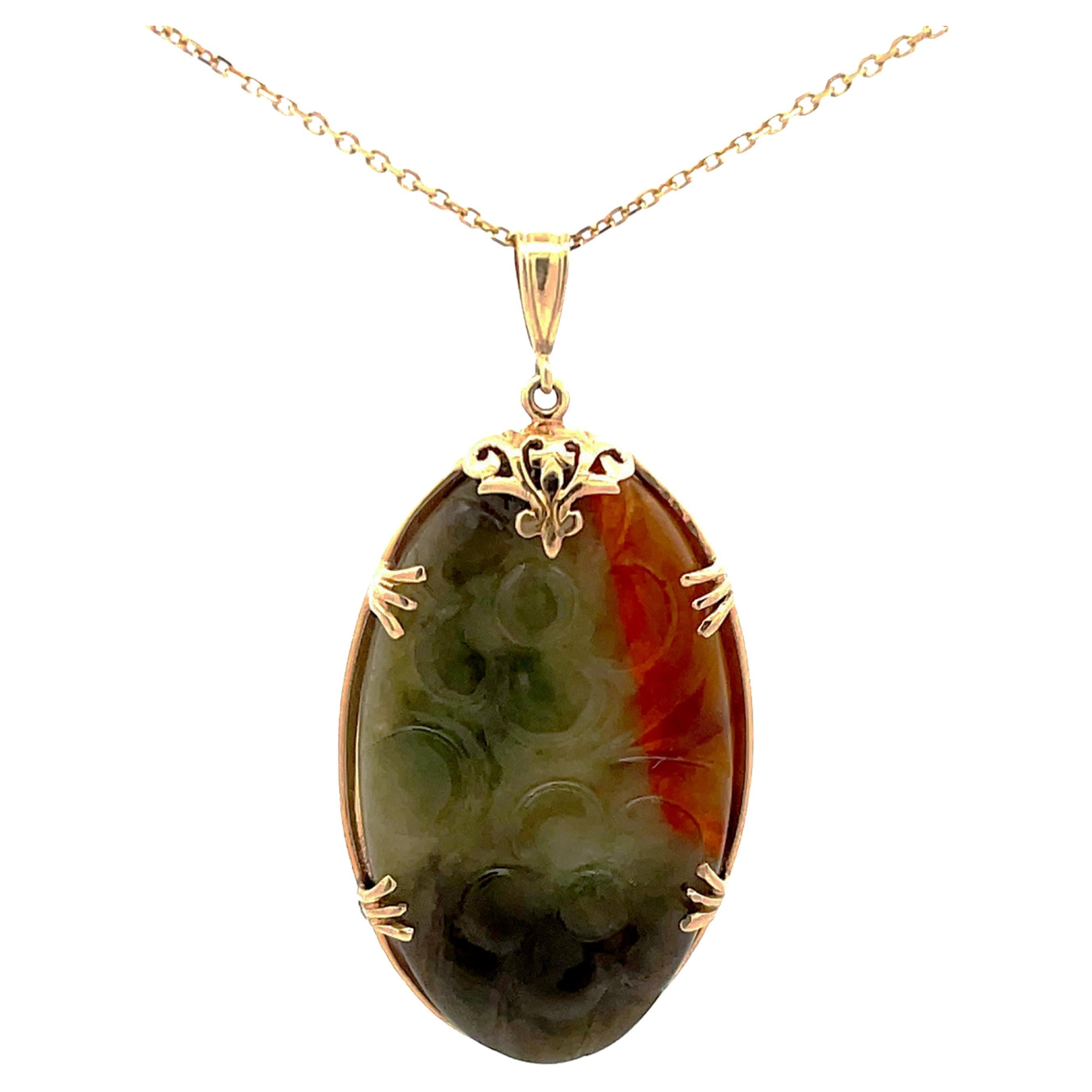 Mings Hawaii Carved Green and Red Oval Jade Pendant and Chain in 14k Yellow Gold For Sale