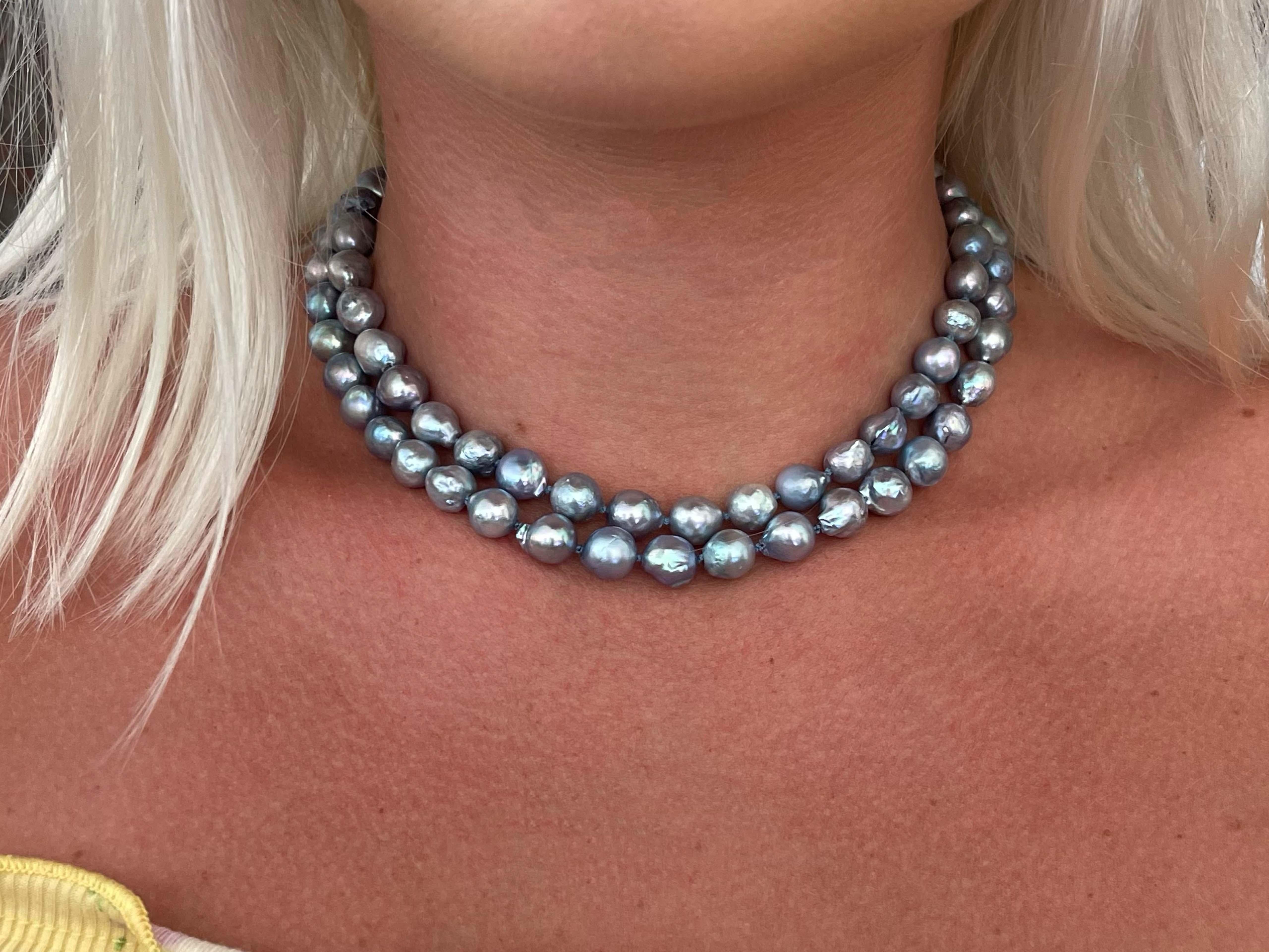 Specifications:

Designer: Ming's

Metal: 14k Yellow Gold

Gemstones: Cultured Baroque Pearls and carved grey jade clasp

Total Weight: 73.9 Grams

Necklace Length: 32