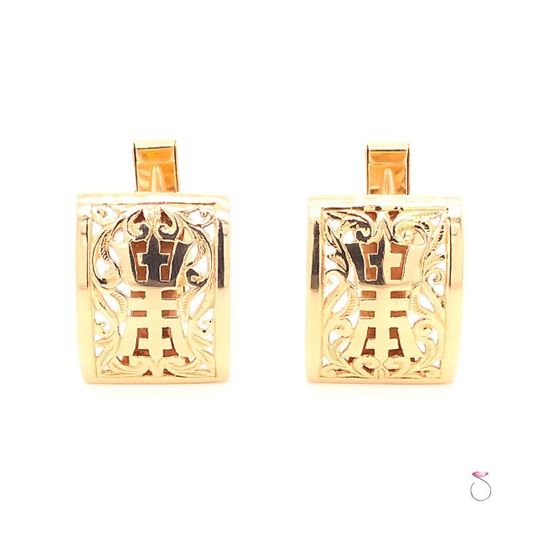 Very elegant rare Ming's Hawaii pair of cufflinks in 14k yellow gold. These beautiful cufflinks feature the cut out Chinese character symbol of 