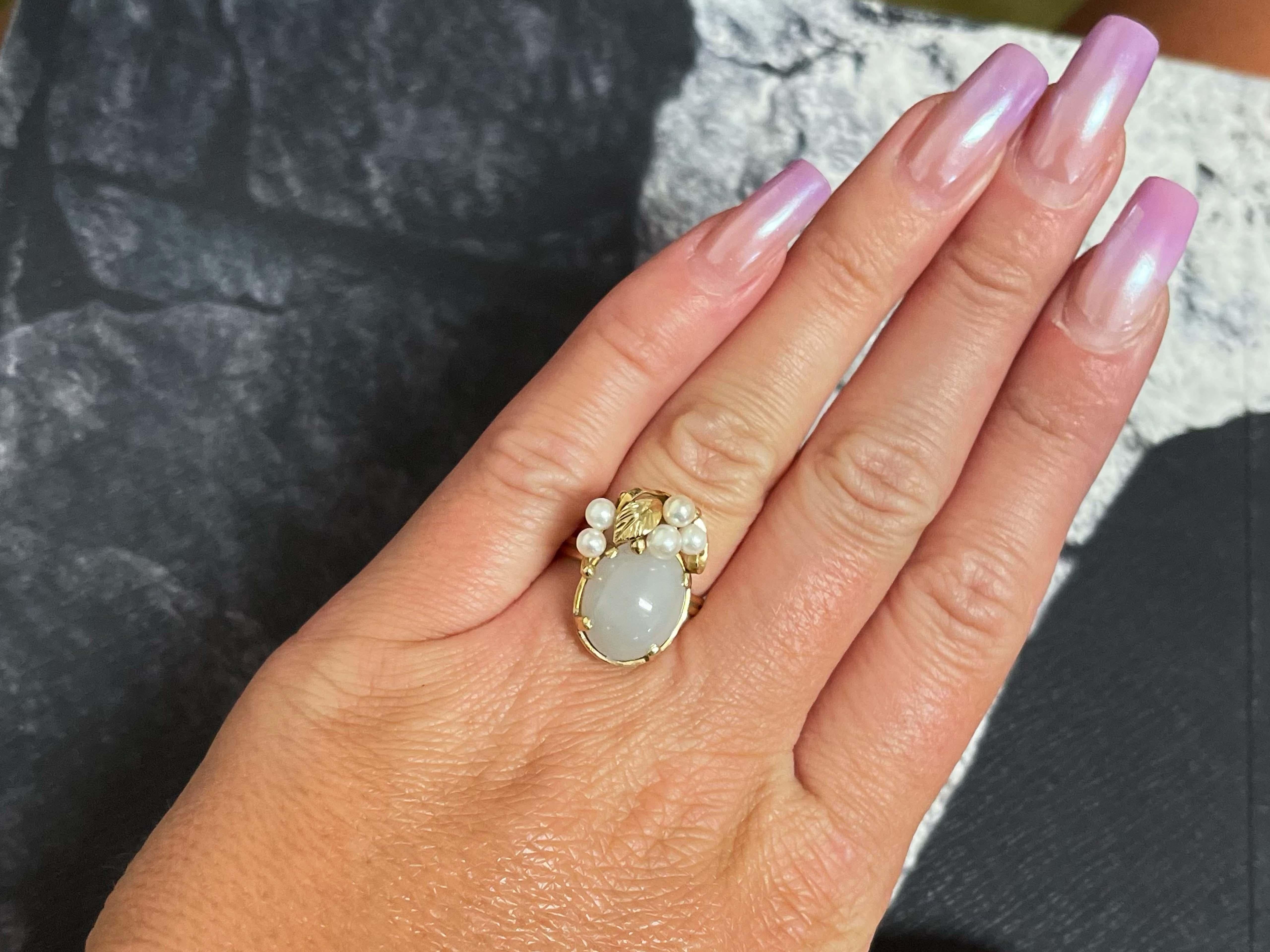 Ring Specifications:

Designer: Ming's

Stone: Akoya Pearl and Jade

Metal: 14k Yellow Gold

Total Weight: 5.4 Grams

Ring Size: 7 (resizable) please message us for resizing BEFORE purchasing

Stamped: 