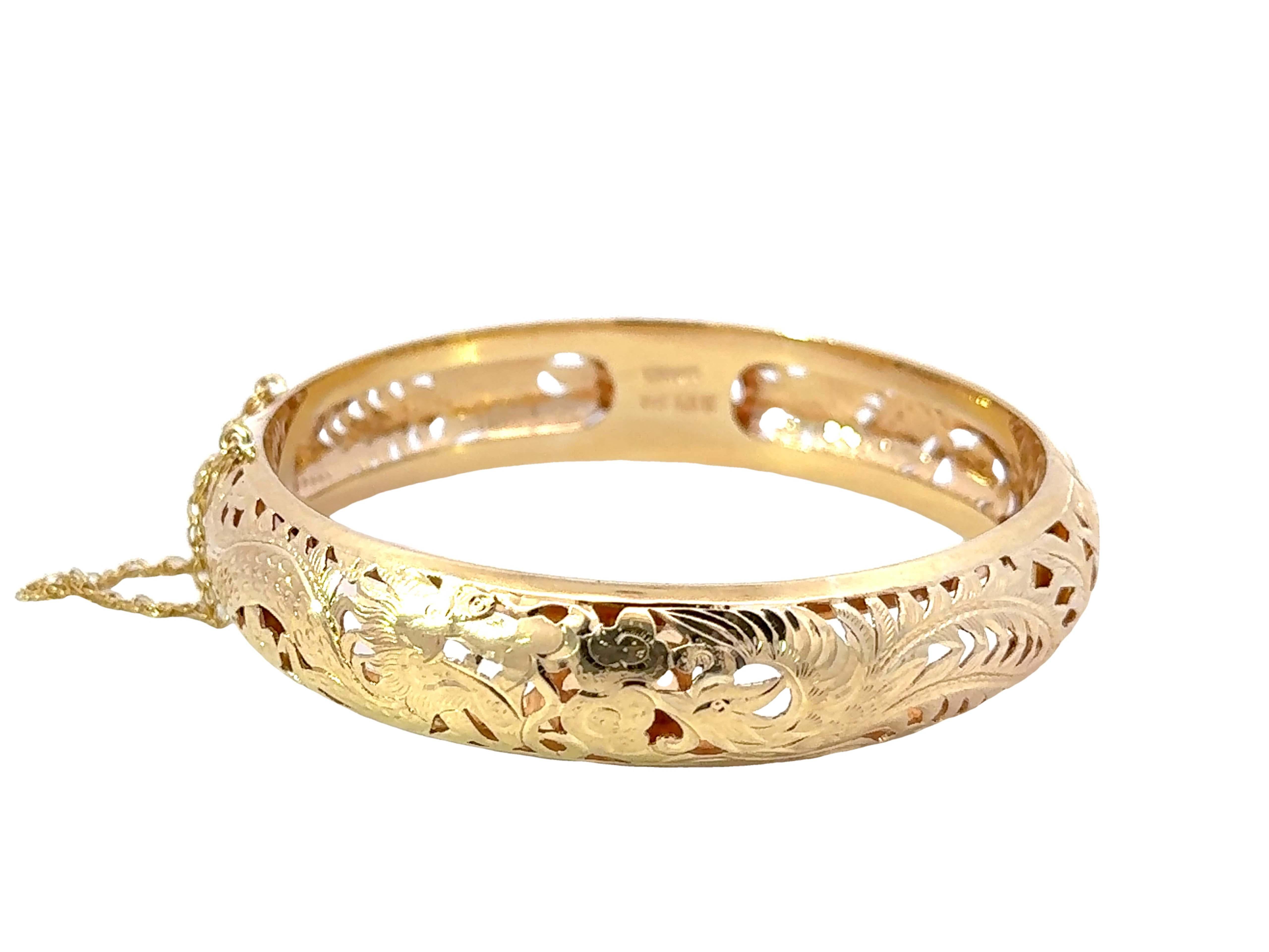 Specifications:

Designer: Ming's

Metal: 14k Yellow Gold

Total Weight: 59.1 Grams

Bracelet Circumference: ~7.0