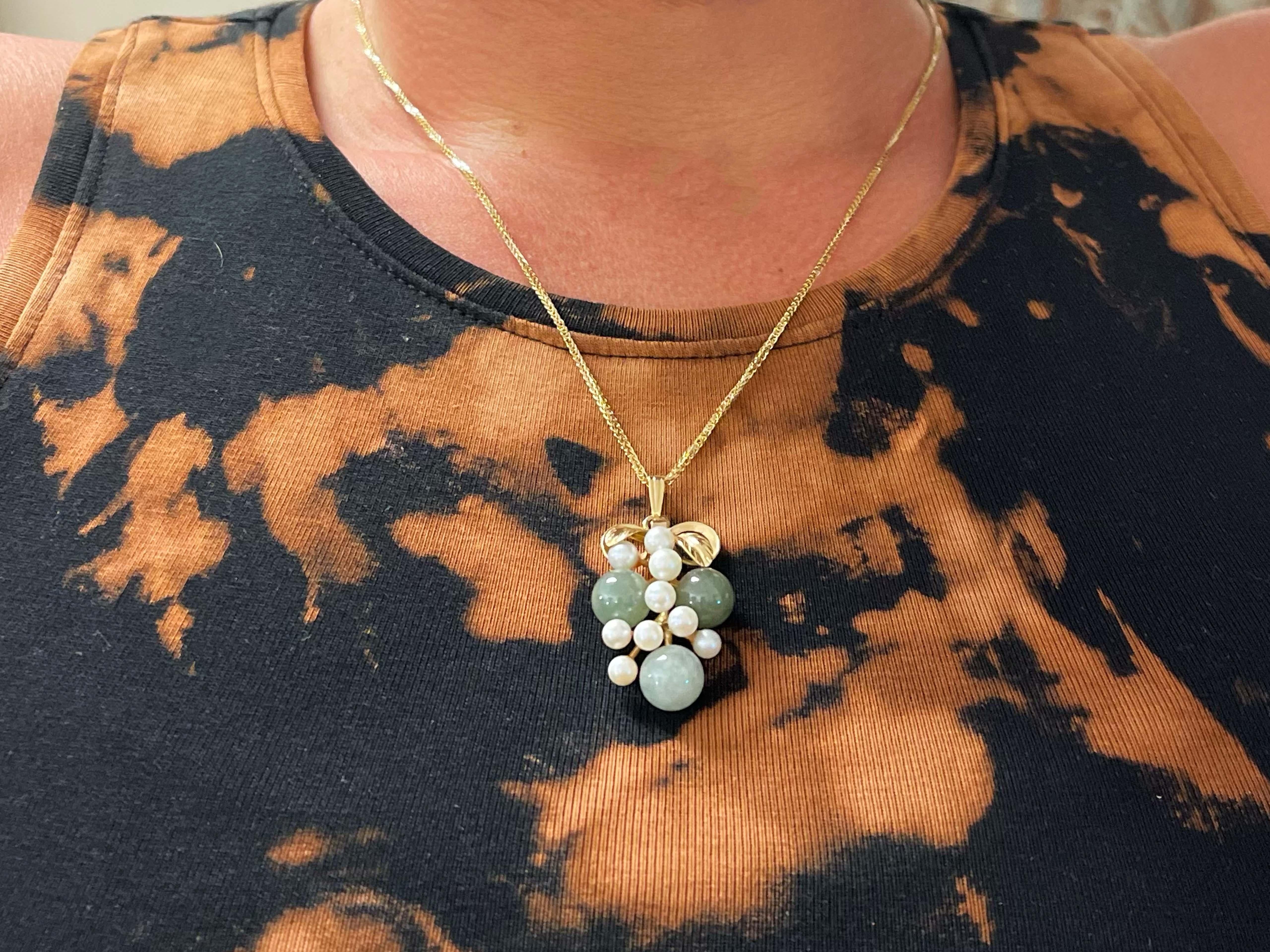 Item Specifications:

Metal: 14k Yellow Gold

Gemstone Specifications:

Gemstone: Jade

Color: green

Cut: round
​
​Second Gemstone: Akoya Pearl

Chain Length: 20
