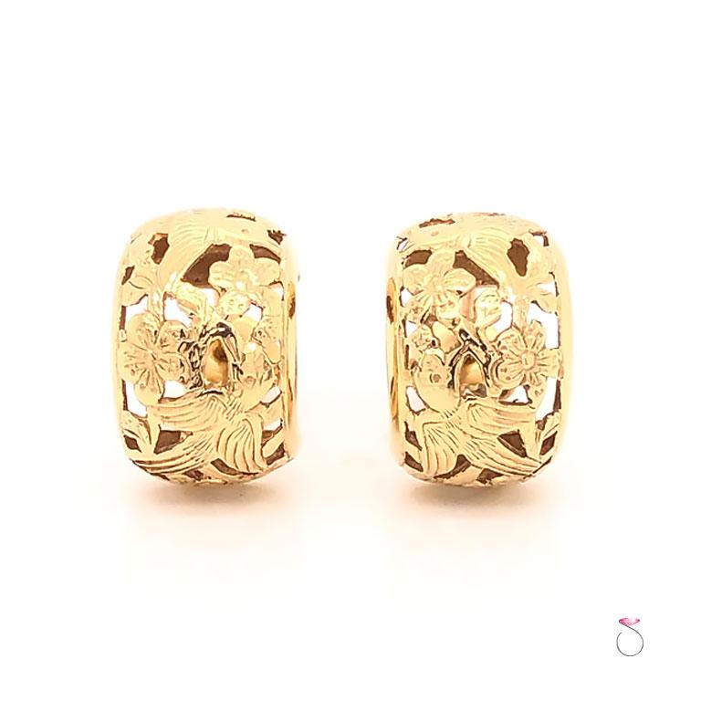A gorgeous rare Ming's Hawaii bird on a plum earrings in 14k yellow gold. The cut out design of this beautiful and the highly desirable two birds on a plum blossom design is just stunning. Each side of the earrings feature a pair birds on a plum