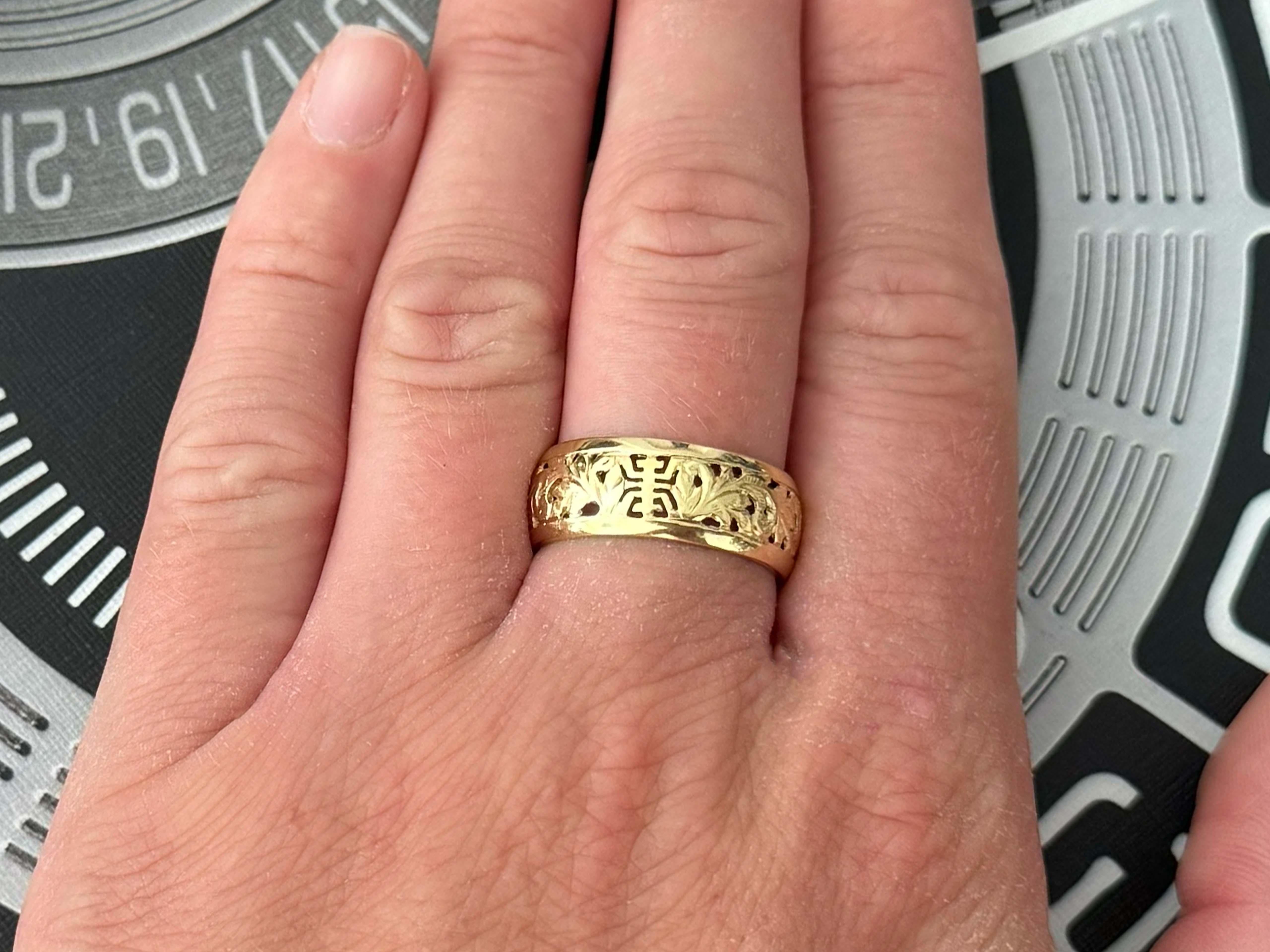 Ring Specifications:

Designer: Ming's

Metal: 14k Yellow Gold

Total Weight: 4.2 Grams
​
​Band Width: 8 mm wide

Ring Size: 8.75 (resizable)

Stamped: 