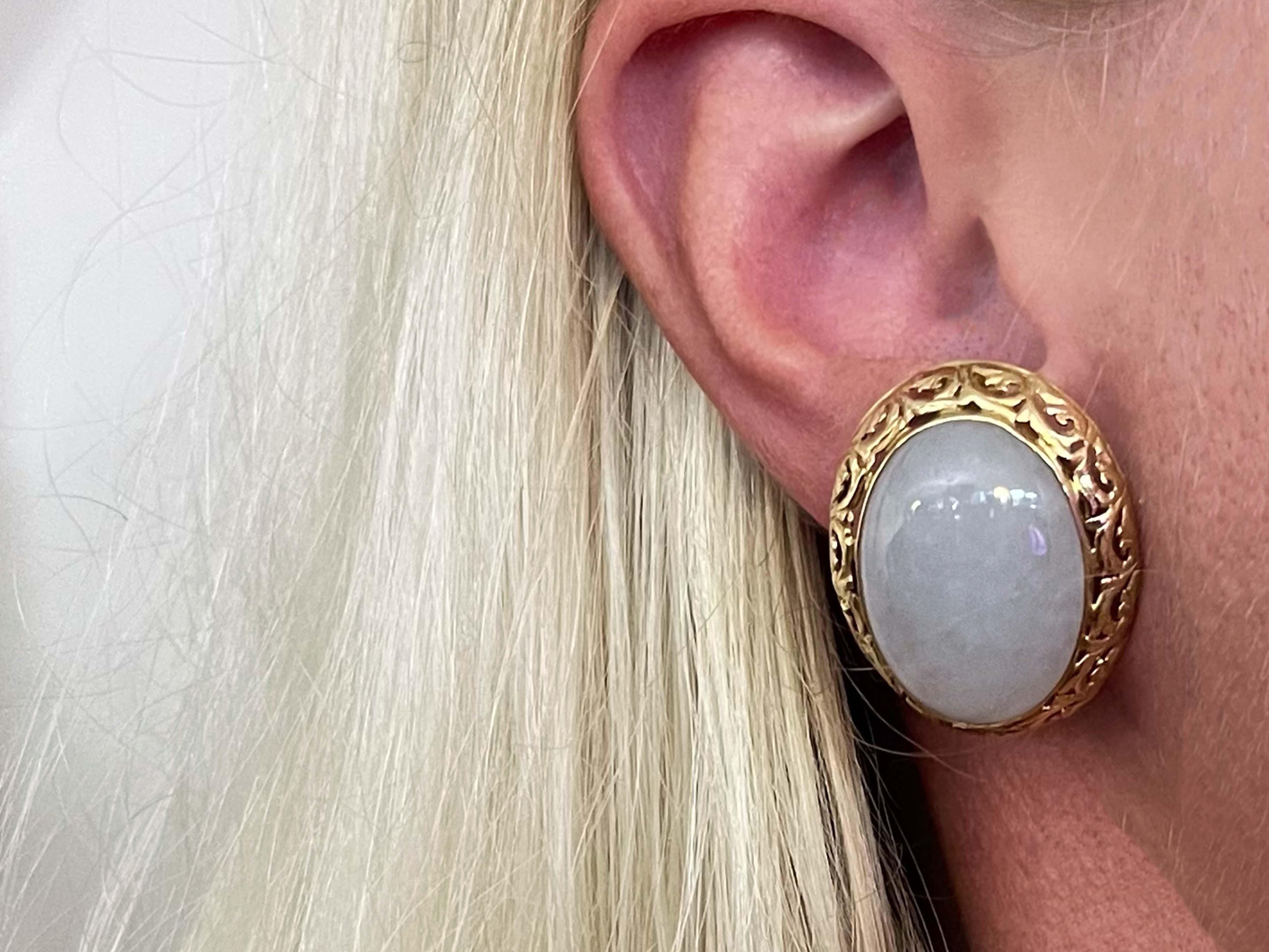 Earrings Specifications:

Designer: Ming's

Metal: 14K Yellow Gold

Jade: Natural White Jade
​
​Jade Measurements: 24 mm x 17 mm x 7 mm

Total Weight: 21.7 Grams

Earring Measurements: ~29 mm x 24 mm

Stamped: 