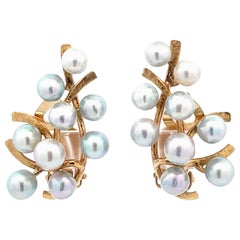 Mings Pendientes de clip de oro amarillo de 14k con forma de hoja de perla azul