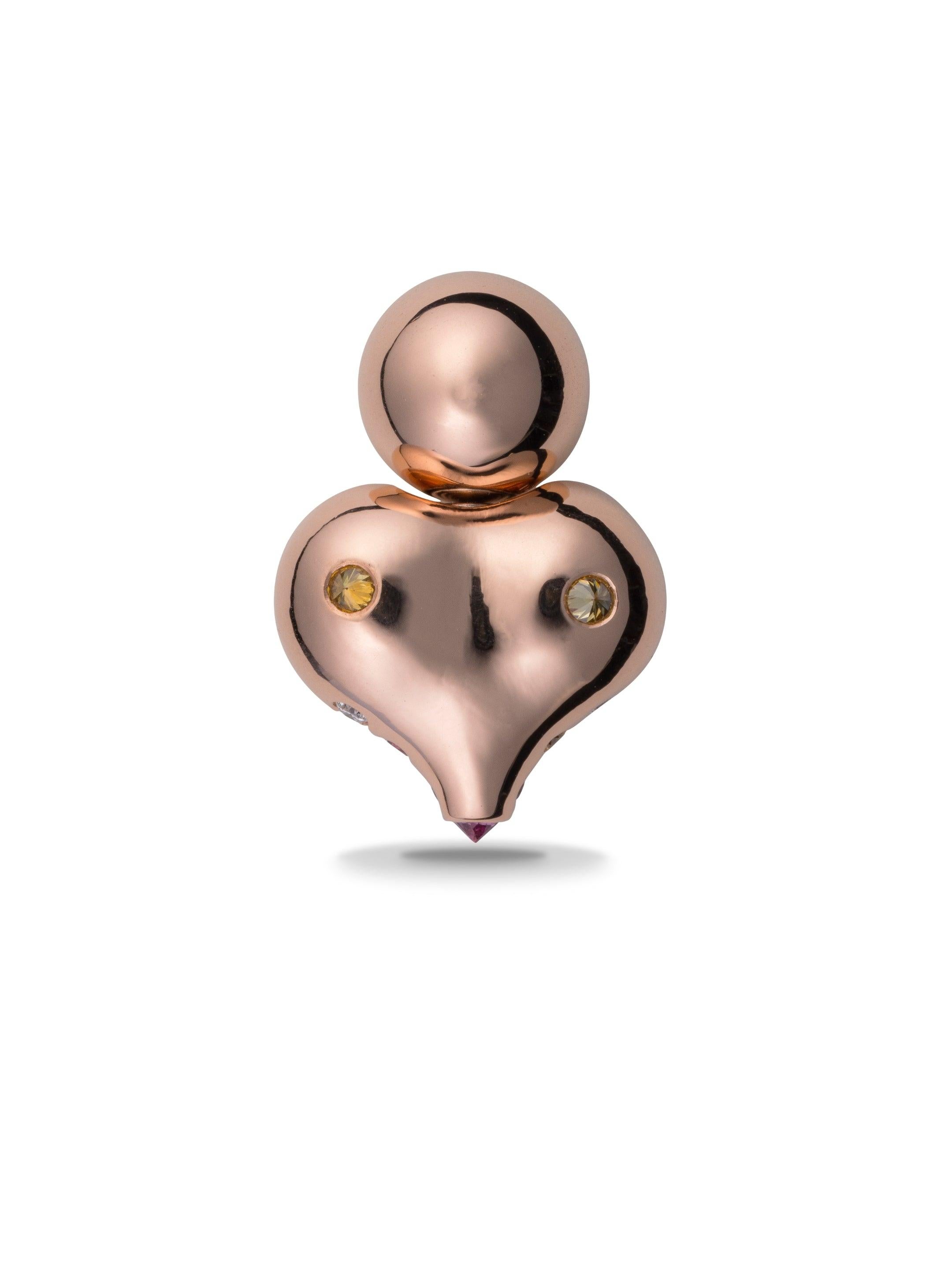 The 'Buddha Ear' is a transformable magnetic earring designed and handcrafted in Geneva, Switzerland. Sustainably made from ethical 18k rose gold, this jewellery is delicately pavé-set with natural purple garnets or sapphires*, pink sapphires, white