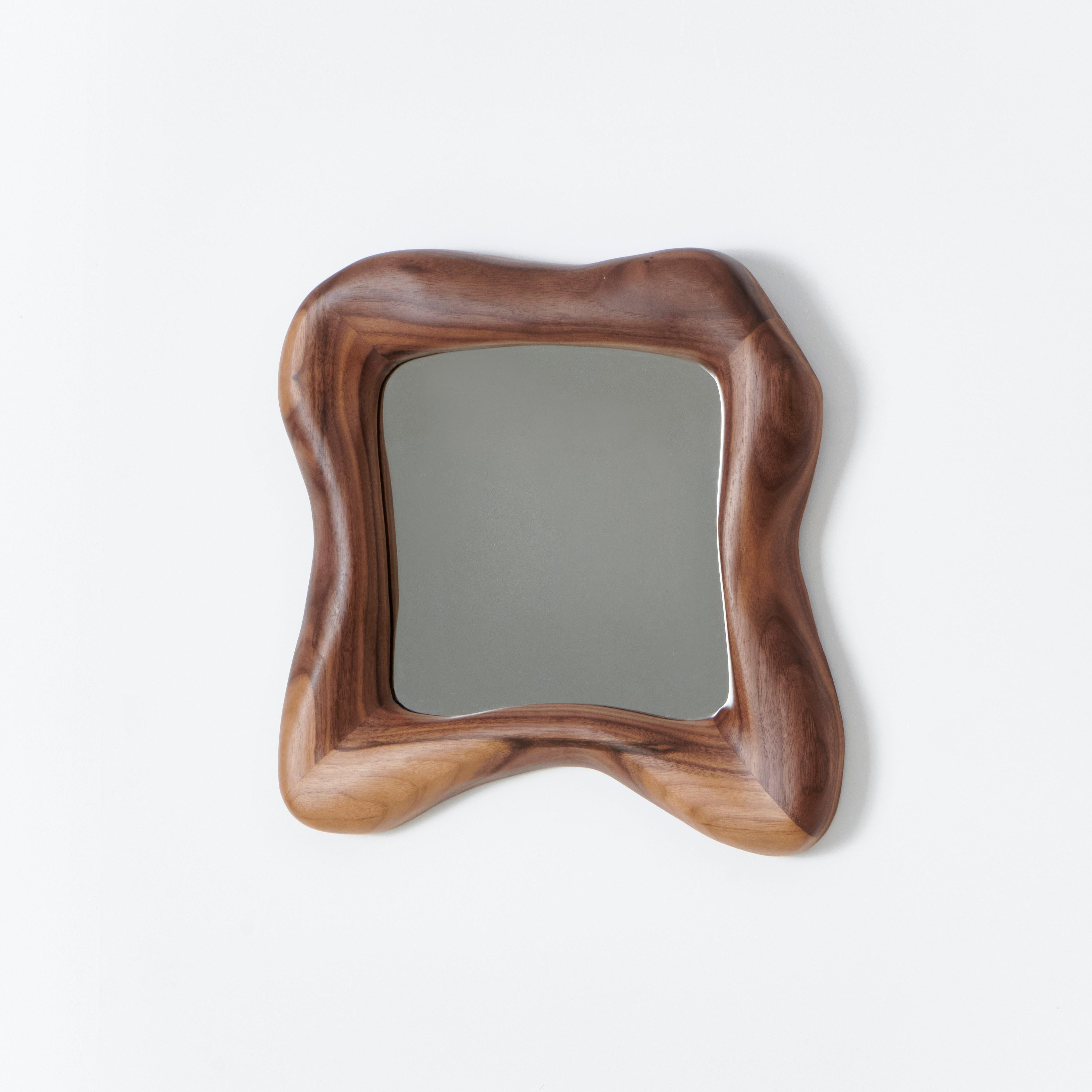 Minho Mirror
Designed by Project 213A in 2024

The Minho mirror is framed in solid wood with an abstract organic shape.
Crafted by Skilled artisans in Northern Portugal.
Bespoke dimensions available upon request

Please note wood is a natural