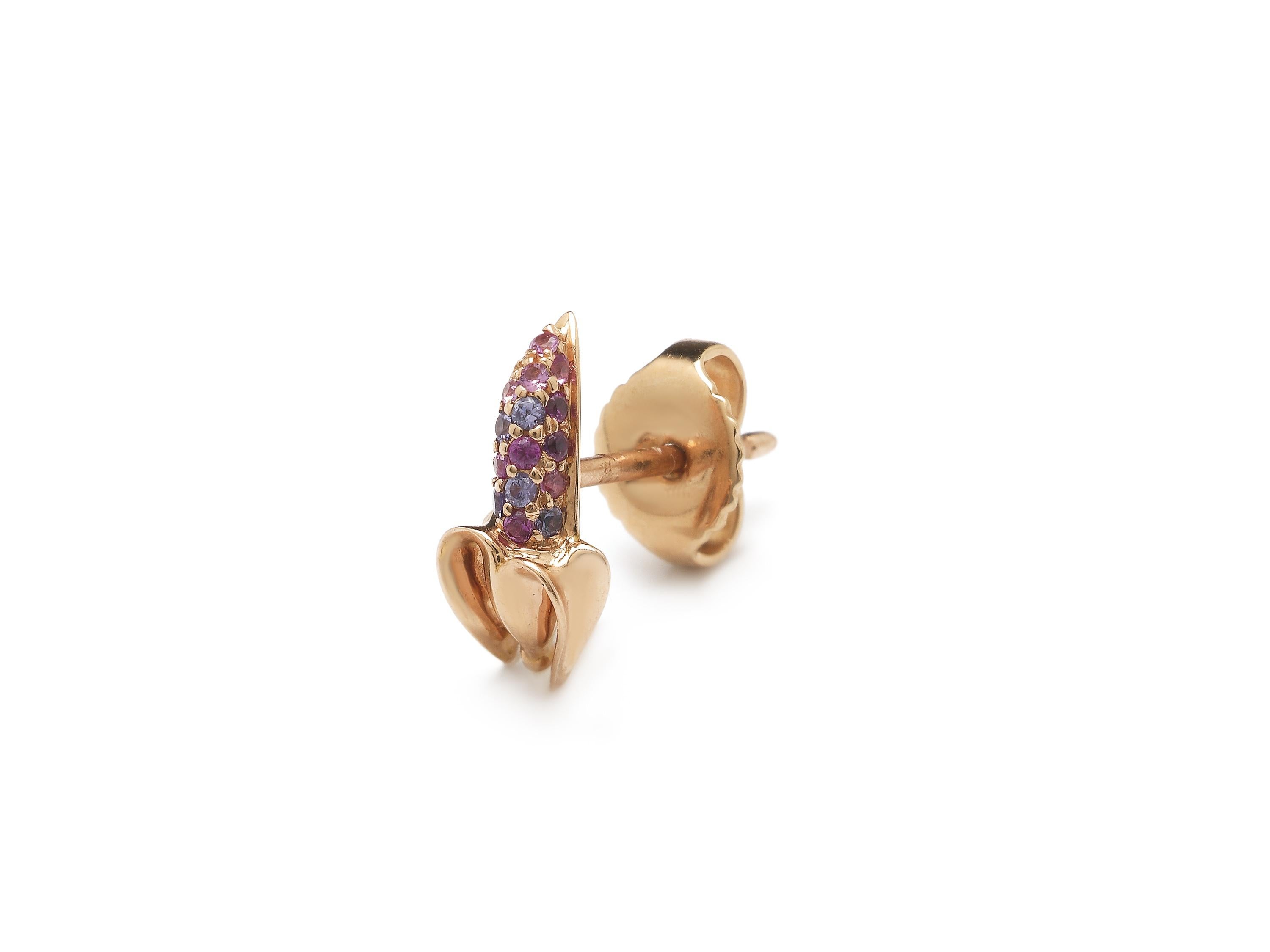 Chic when worn alone, or statement-making when combined with multiple studs on the lobe, the Mini Banana Stud Pink Sapphire is fashioned in 18k rose gold and designed as a peeled banana, with the fruit inside embellished with pink and purple