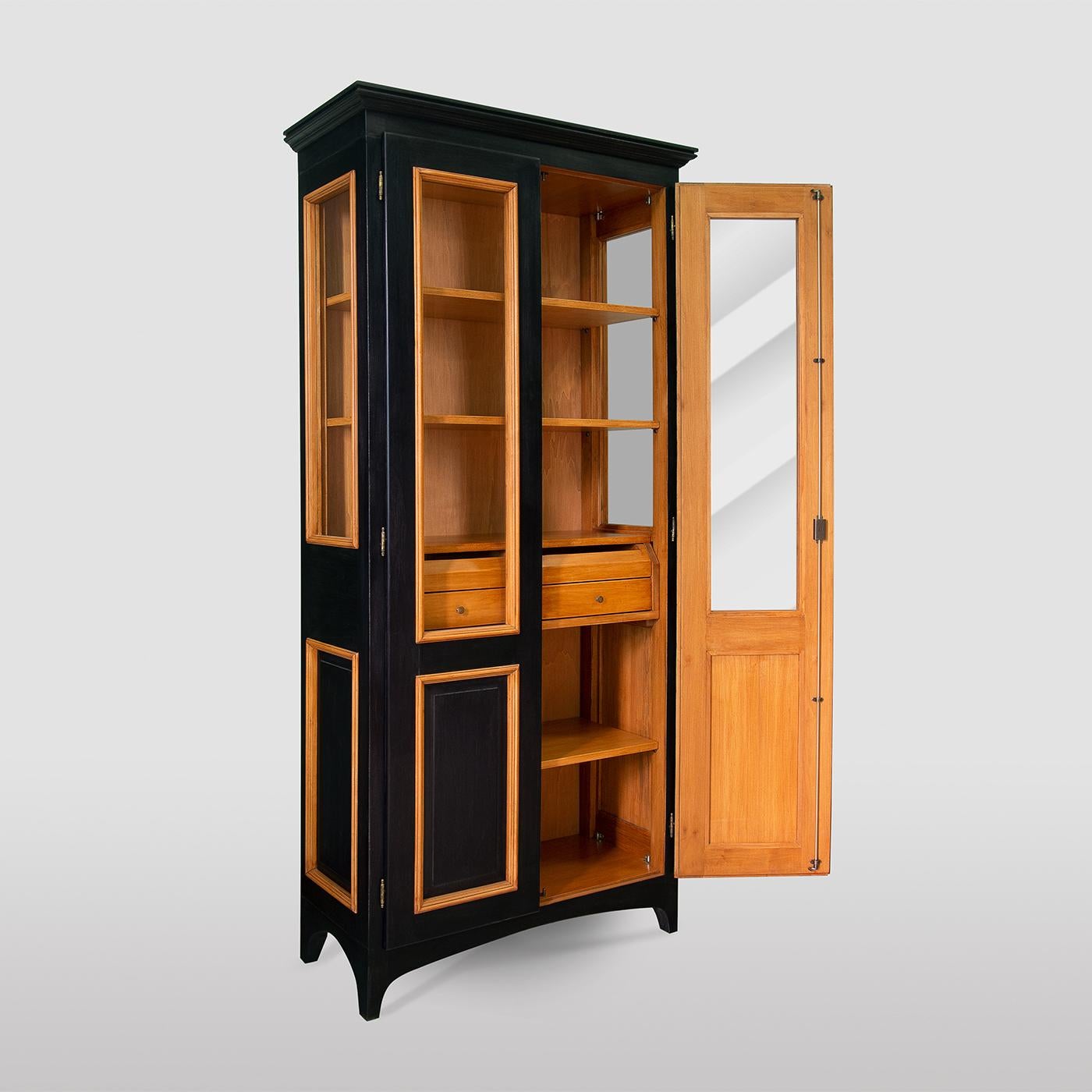 Superbly crafted by Italian artisans with a lime wood structure, this display cabinet brings a classic statement into a modern home, creating a truly sophisticated statement. The rich walnut stain of the sober and sturdy silhouette is highlighted by