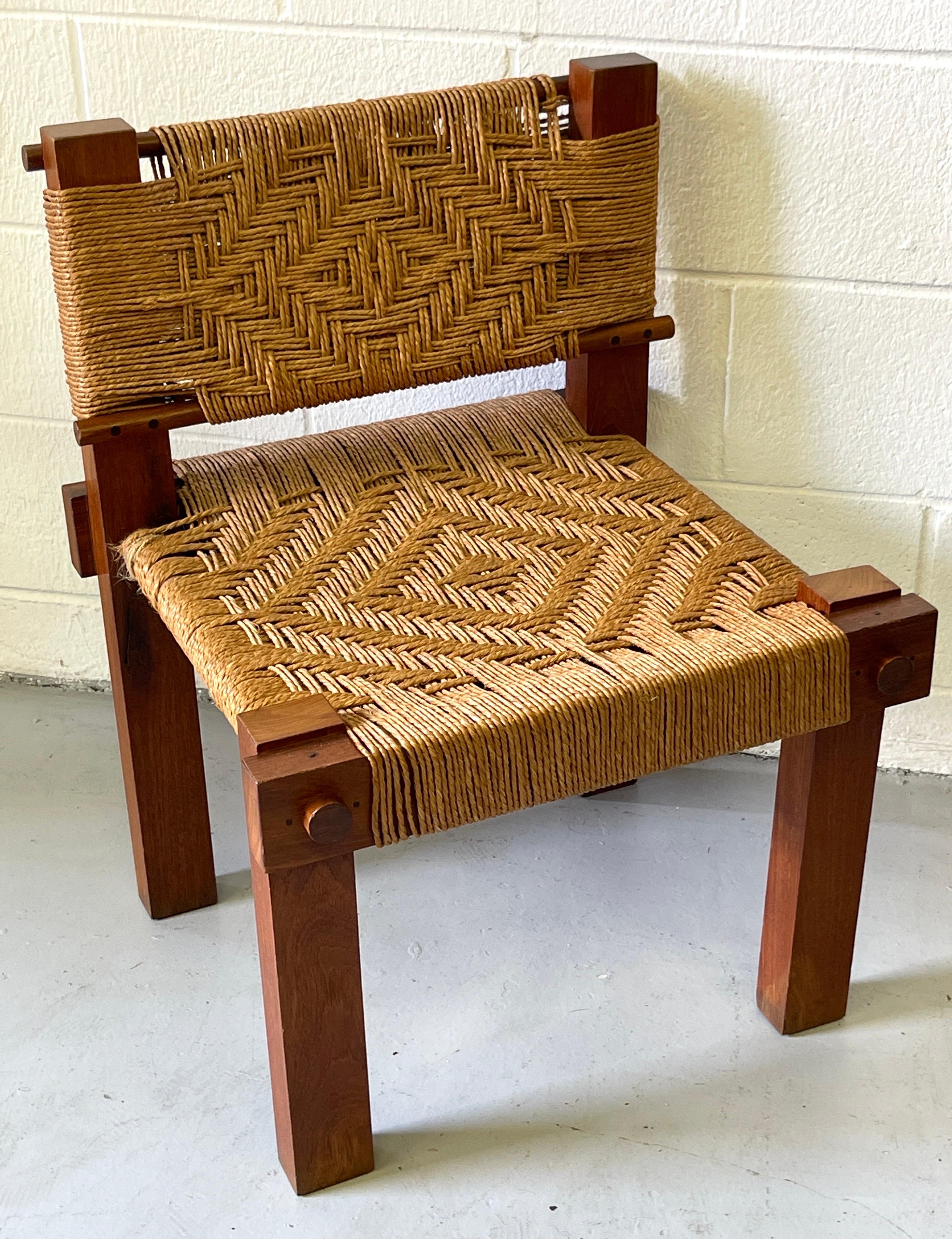 Mini Boga for Taaru, teak & woven rope occasional chair 
India, Circa 1960s

A fine example, of doweled teak construction, with hand-woven geometric woven rope back and seat rest. Branded signature on the rear left leg.

Overall measurements 
The