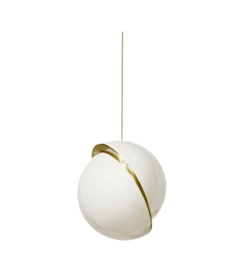 A miniature version of the popular Crescent light, this illuminated sphere is sliced asymmetrically in half to reveal a crescent-shaped brushed brass fascia. Mini Crescent seamlessly combines the solid and the opaque.

Dimensions: Height 22cm x