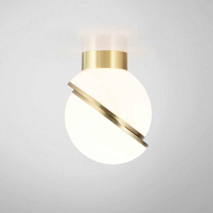 A miniature version of the popular crescent light, this illuminated sphere is sliced asymmetrically in half to reveal a crescent-shaped brushed brass fascia. Mini Crescent seamlessly combines the solid and the opaque.

Dimensions: Height 25cm x
