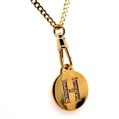 Mini Cuban 14K Yellow Gold Chain with Diamond Letter Disc and Clip Charm Holder.
