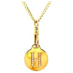 Mini Cuban 14K Yellow Gold Chain with Diamond Letter Disc and Clip Charm Holder.
