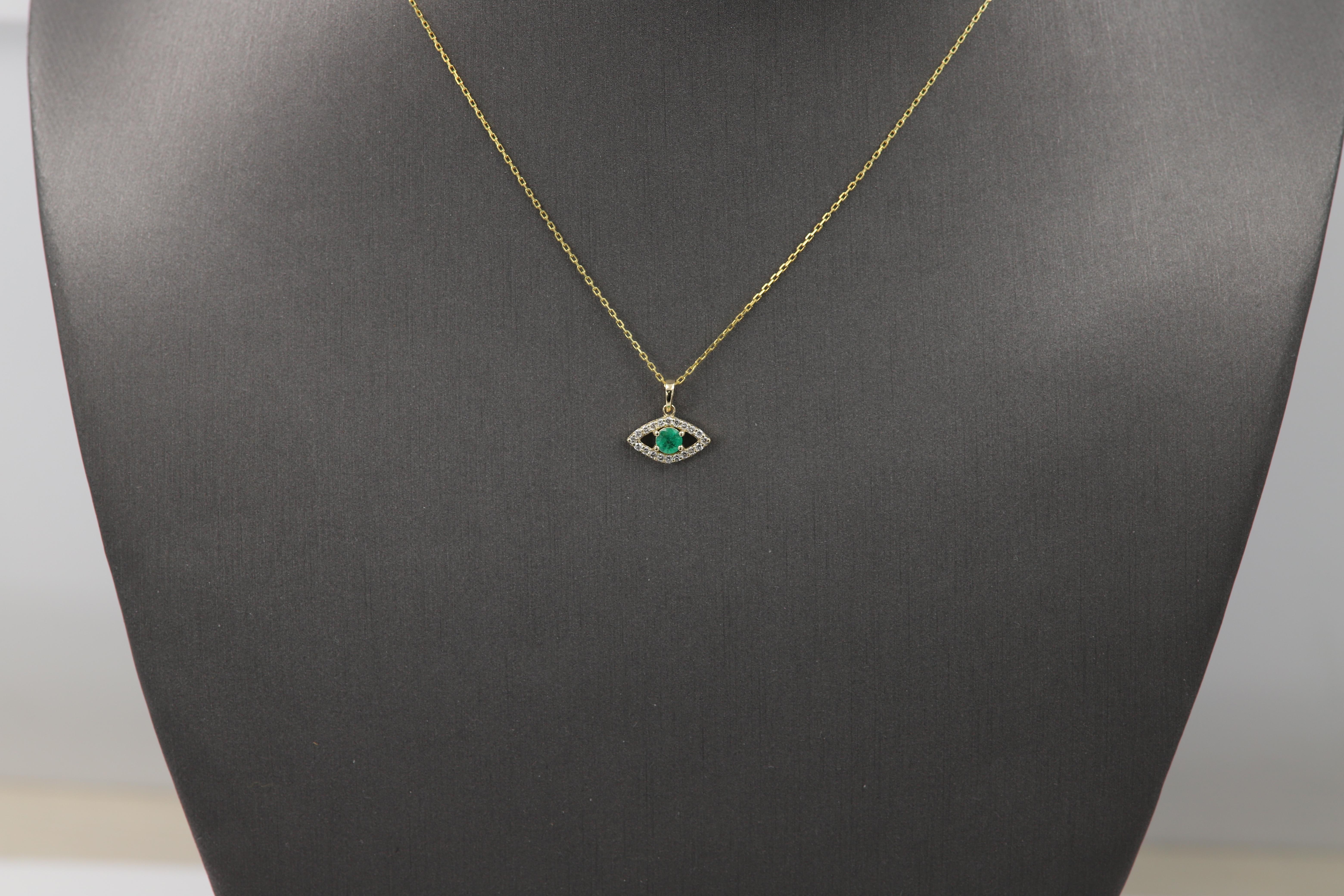 Brilliant Cute Mini Gold Evil Eye Pendant

Natural Diamonds and Orange Sapphire
14k Yellow Gold  0.50 grams (without the chain)
Made with very Shiny quality diamonds G-F-VS approx 0.14 carat.

the small size makes it very cute and trendy.
Center 