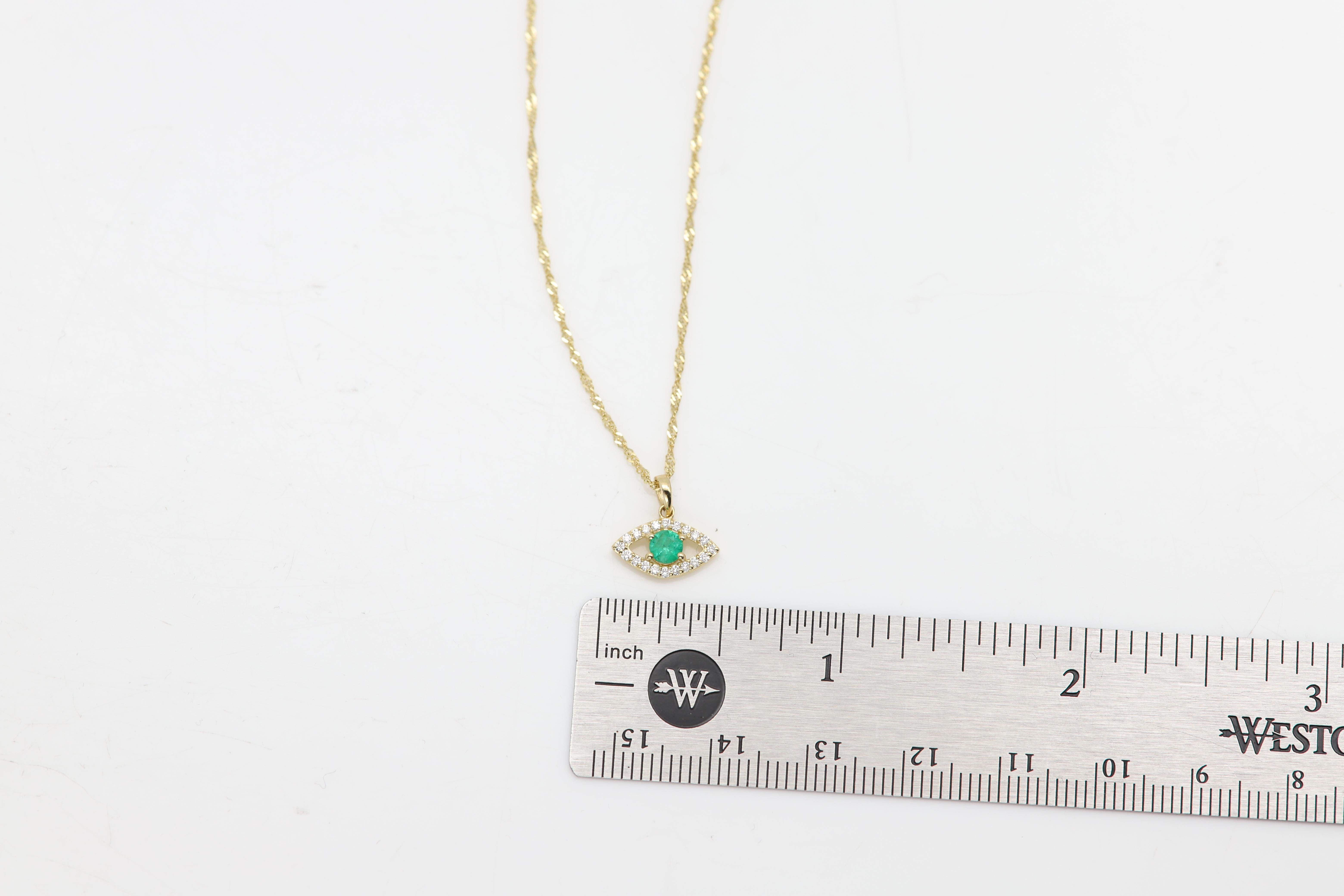 Mini-Diamant Evil Eye 14 Karat Gelbgold mit natürlichem grünem Smaragd in der Mitte Damen im Angebot