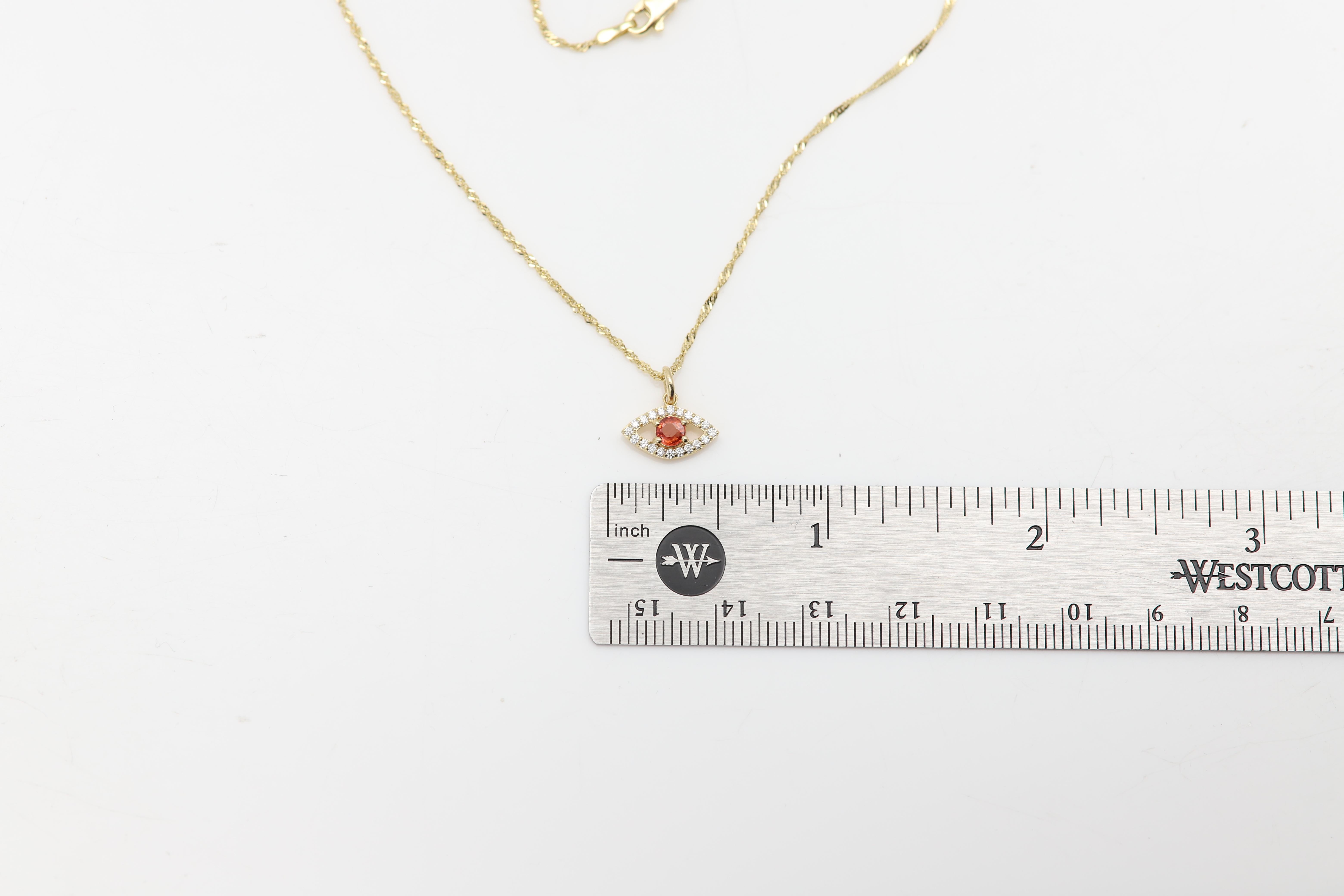 Mini œil maléfique en or jaune 14 carats avec saphir orange naturel au centre en vente 5
