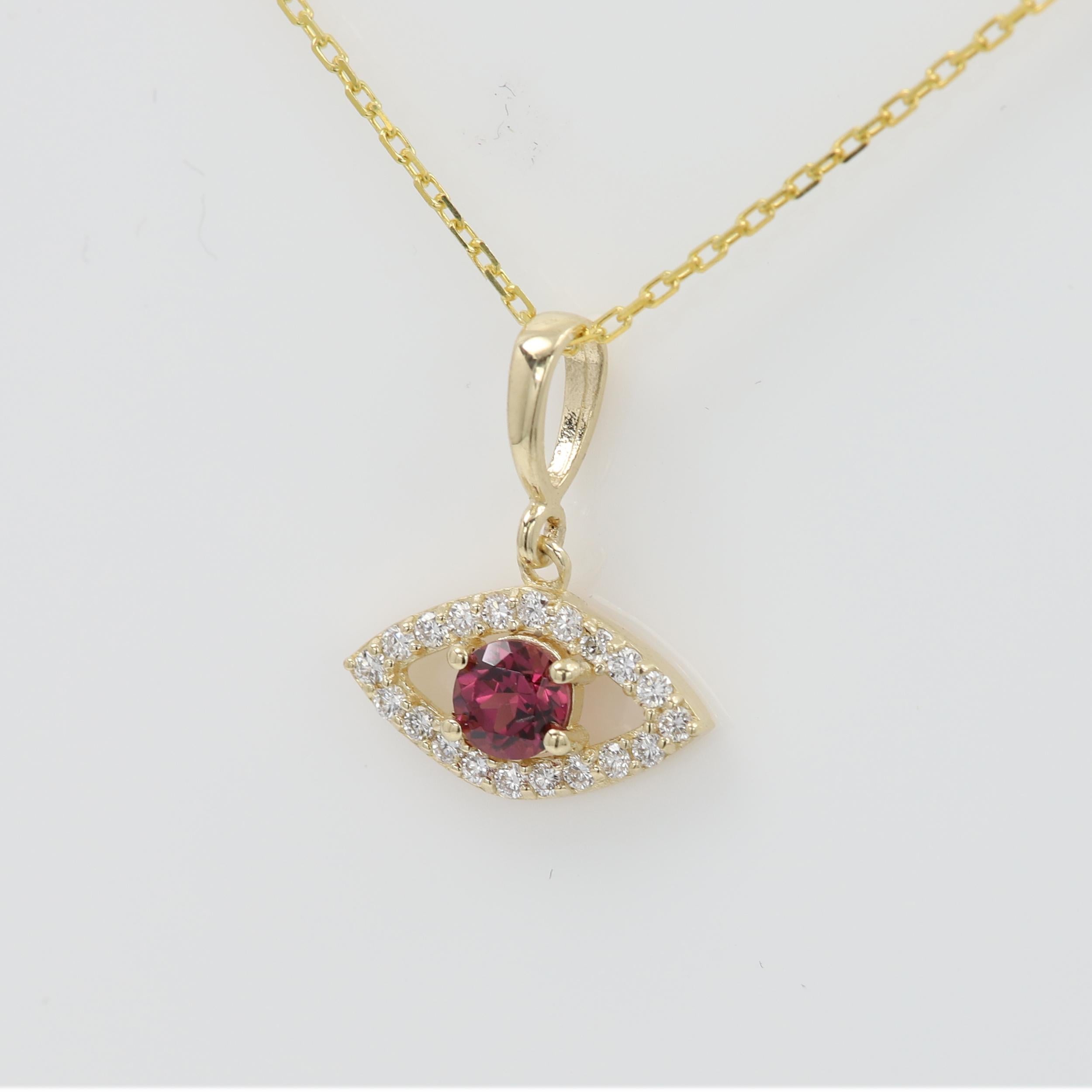 Brilliant Cute Mini Gold Evil Eye Pendant

Natural Diamonds and Rhodolite (a color similar to maroon)
14k Yellow Gold  0.50 grams (without the chain)
Made with very Shiny quality diamonds G-F-VS approx 0.14 carat.

the small size makes it very cute