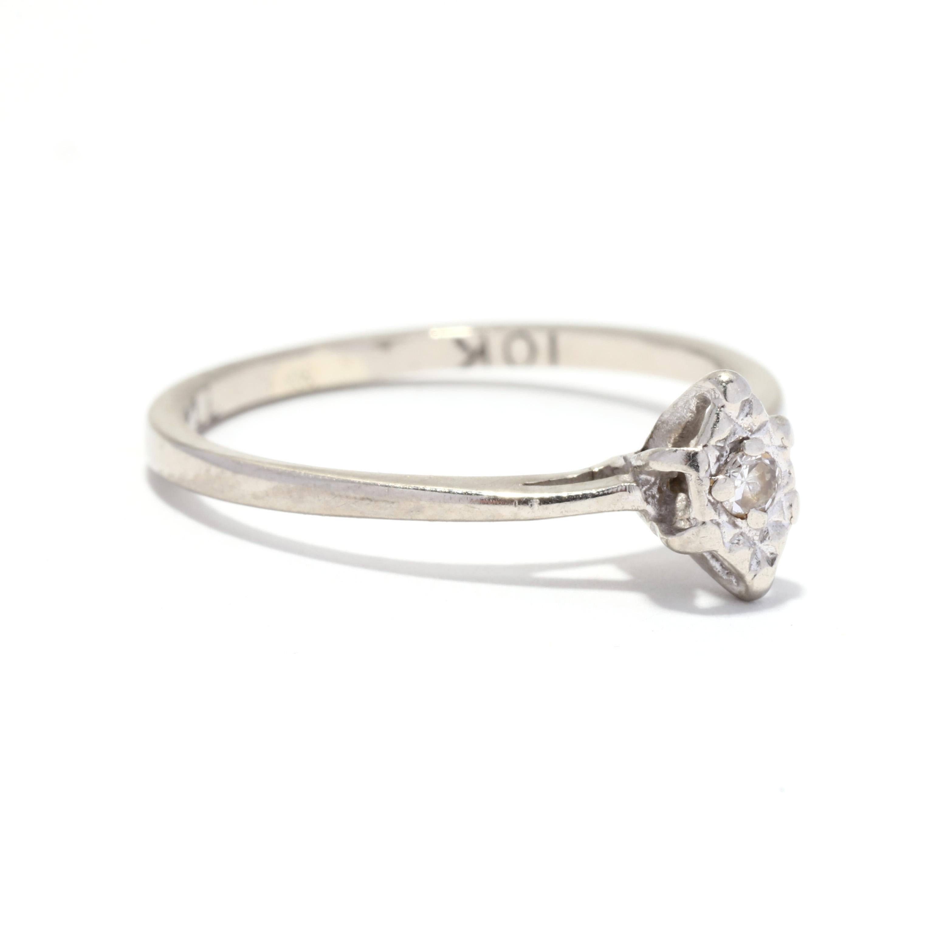 A vintage 10 karat white gold mini diamond navette ring. This ring features a single cut nouns diamond weighing approximately .02 carat set in a marquise shape mounting with a thin band.

Stones:
- diamond, 1 stone
- single cut round
- 1.90 mm
-
