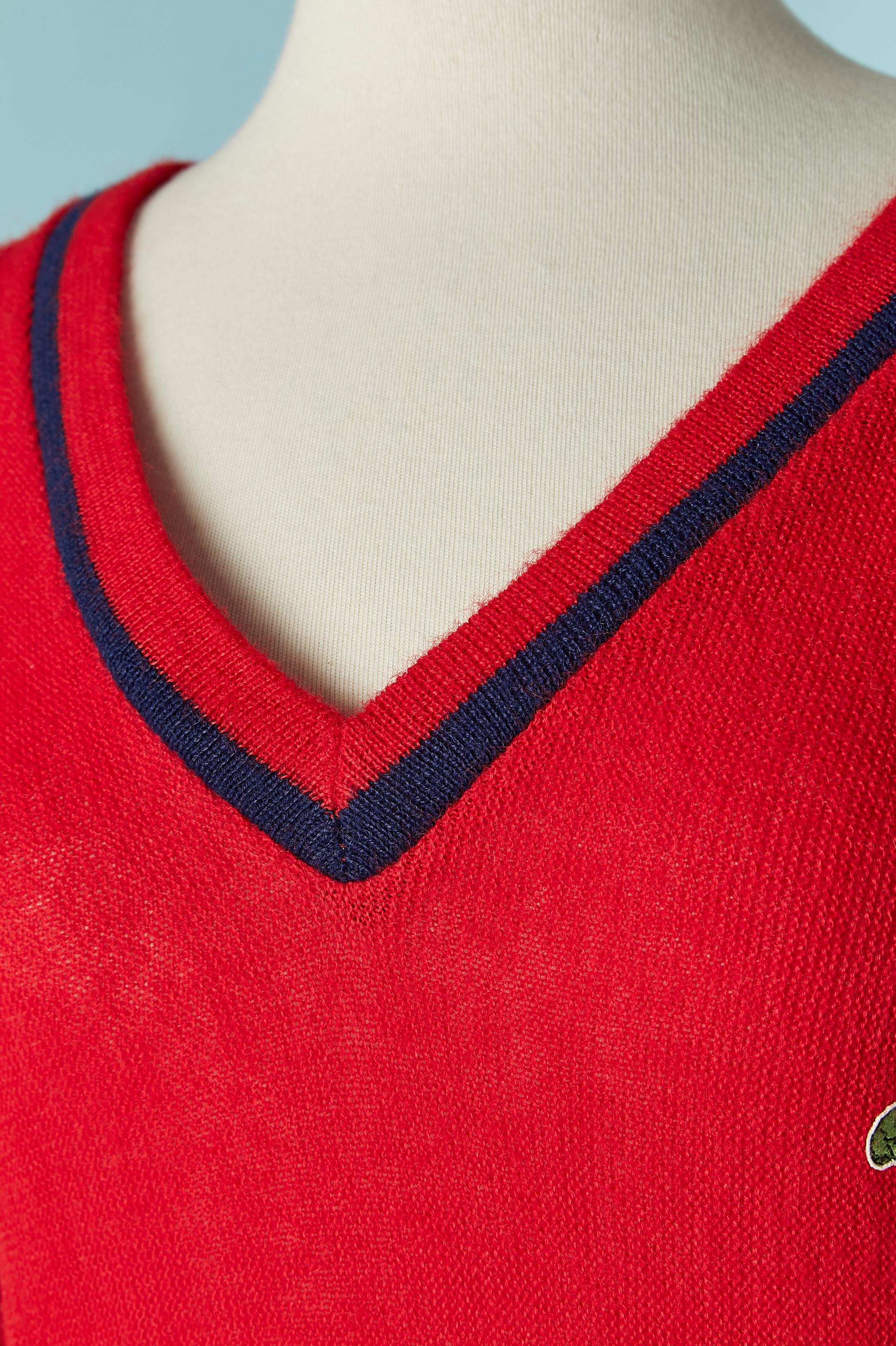 Mini dress in red knit. No fabric tag but the knit is probably a mix of wool and acrylic. 
SIZE S 