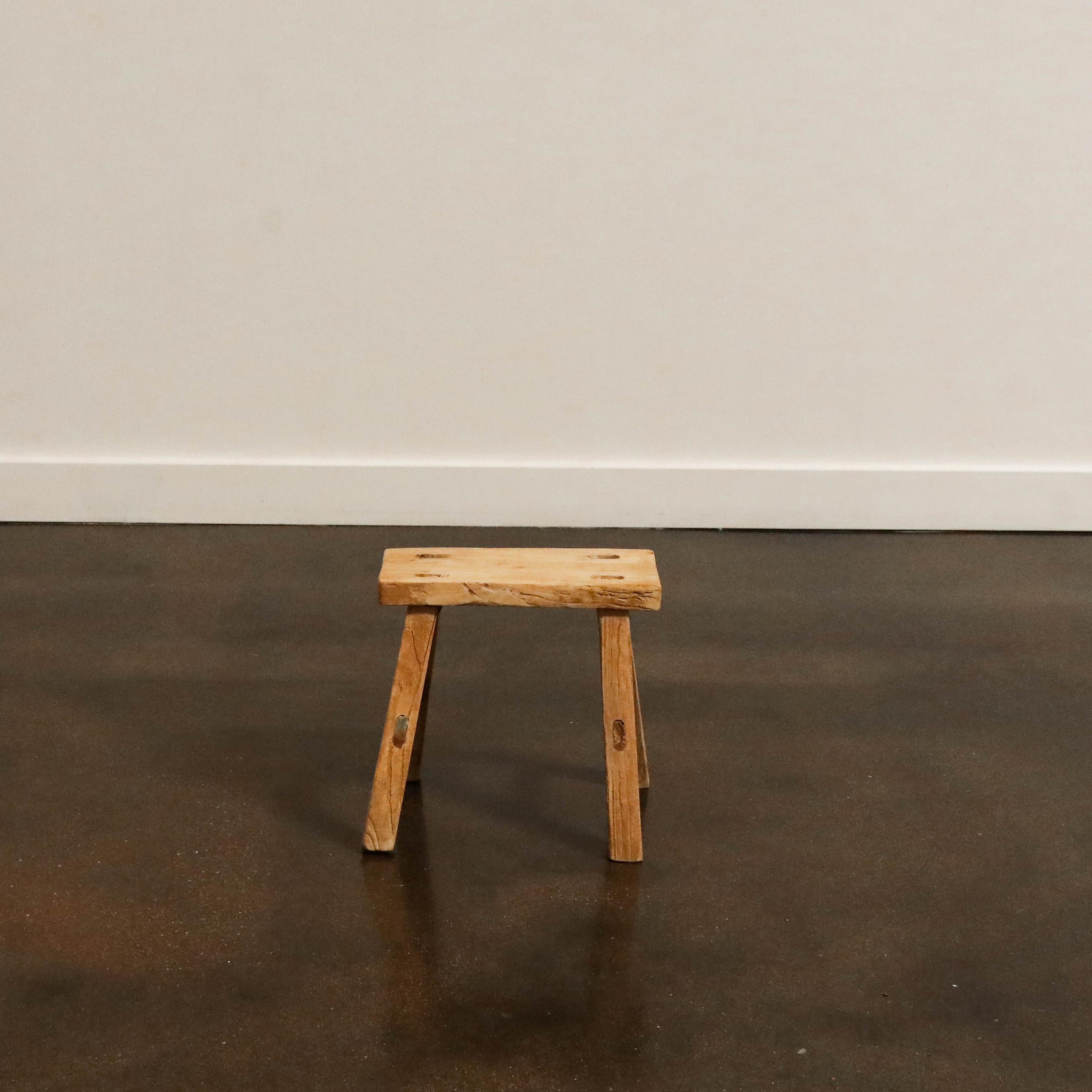 Handmade elm stool imported from Taiwan. Each piece is unique, so please inquire if you have a preference for a specific variation. 