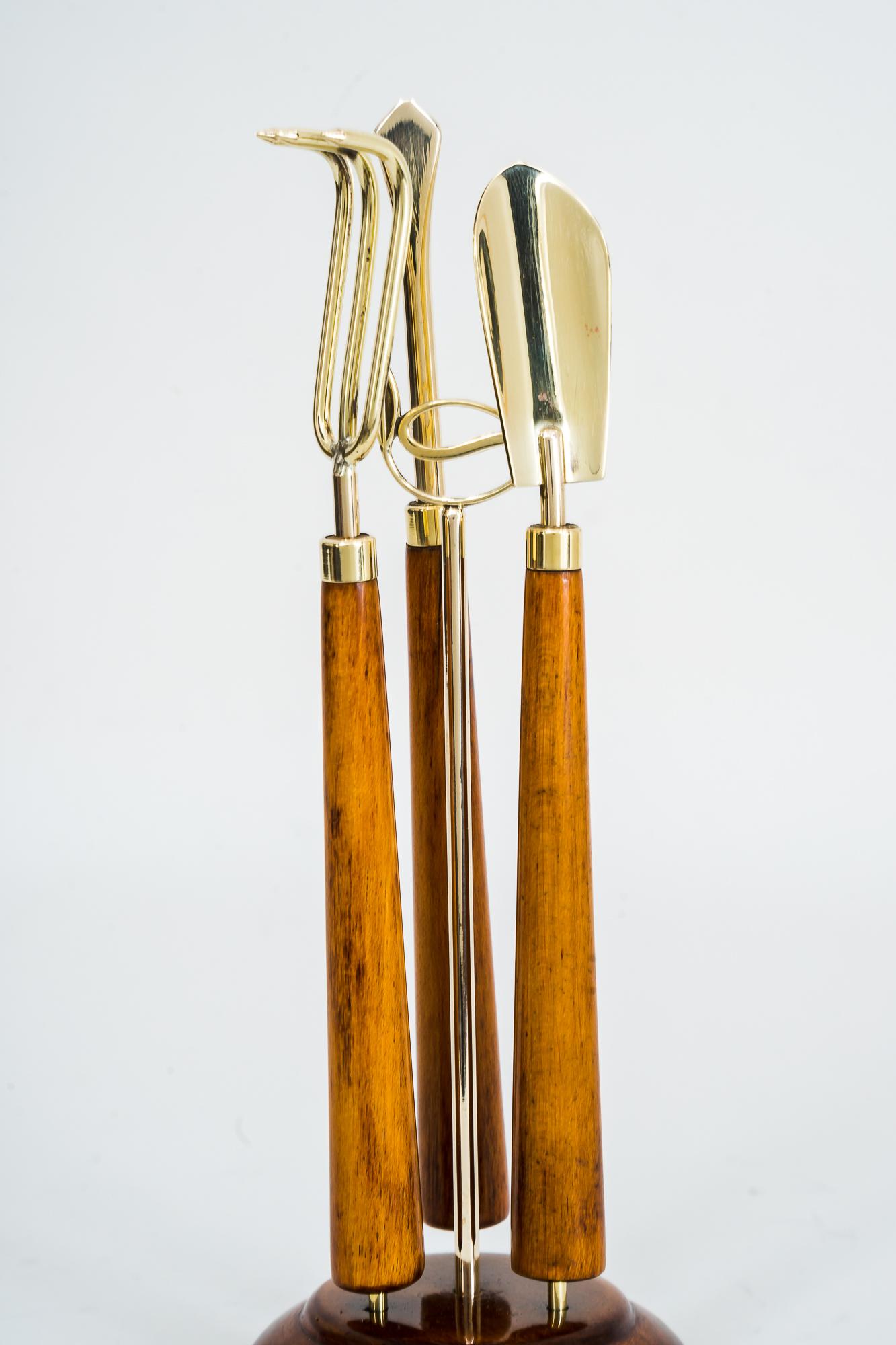 Mini garden tools with wooden handles, Set Of 4, 1970's 
Brass polished and stove enamelled
Nutwood
Made in a very high quality.