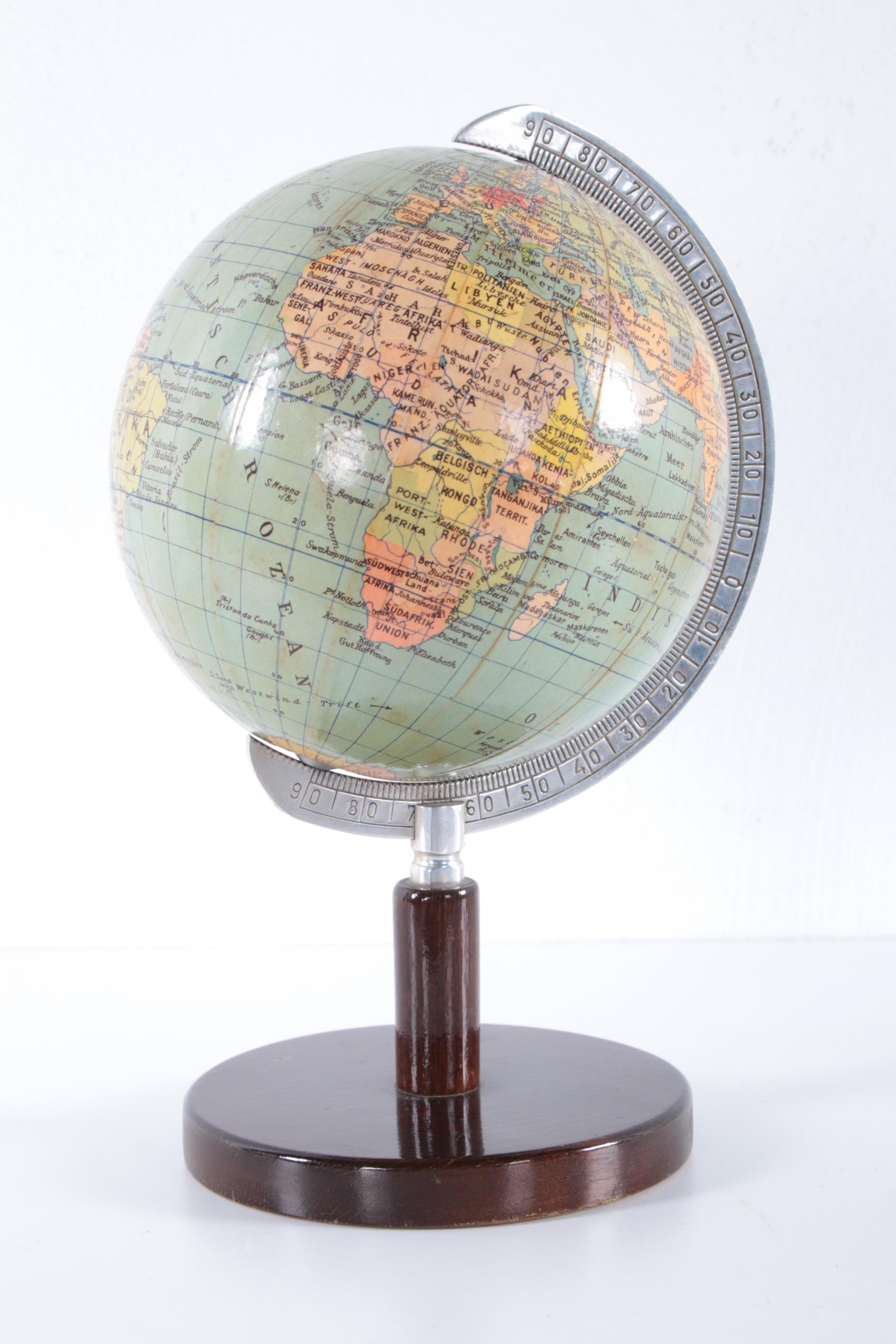 Mini Globe Columbus on wooden base, 1950s


Nice vintage mini globe from Germany made by Columbus design by Paul Oestergaard. The sphere is made of paper with a metal measuring arc and beautiful slim wooden base.

A nice gift for the holidays.