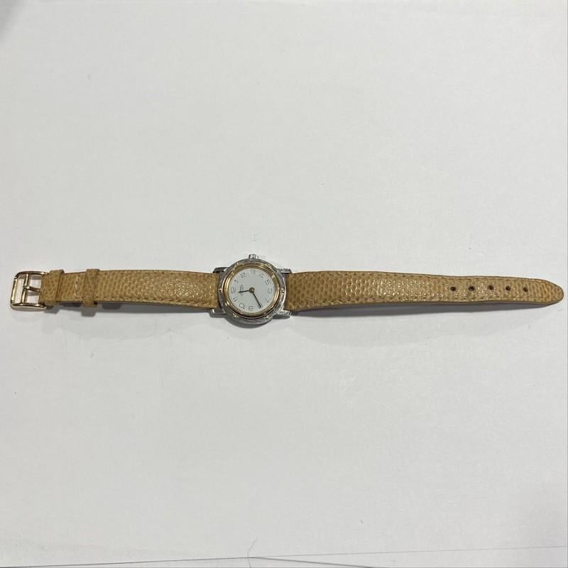 Mini Hermès Clipper Gold und Stahl Uhr für Damen oder Herren im Angebot