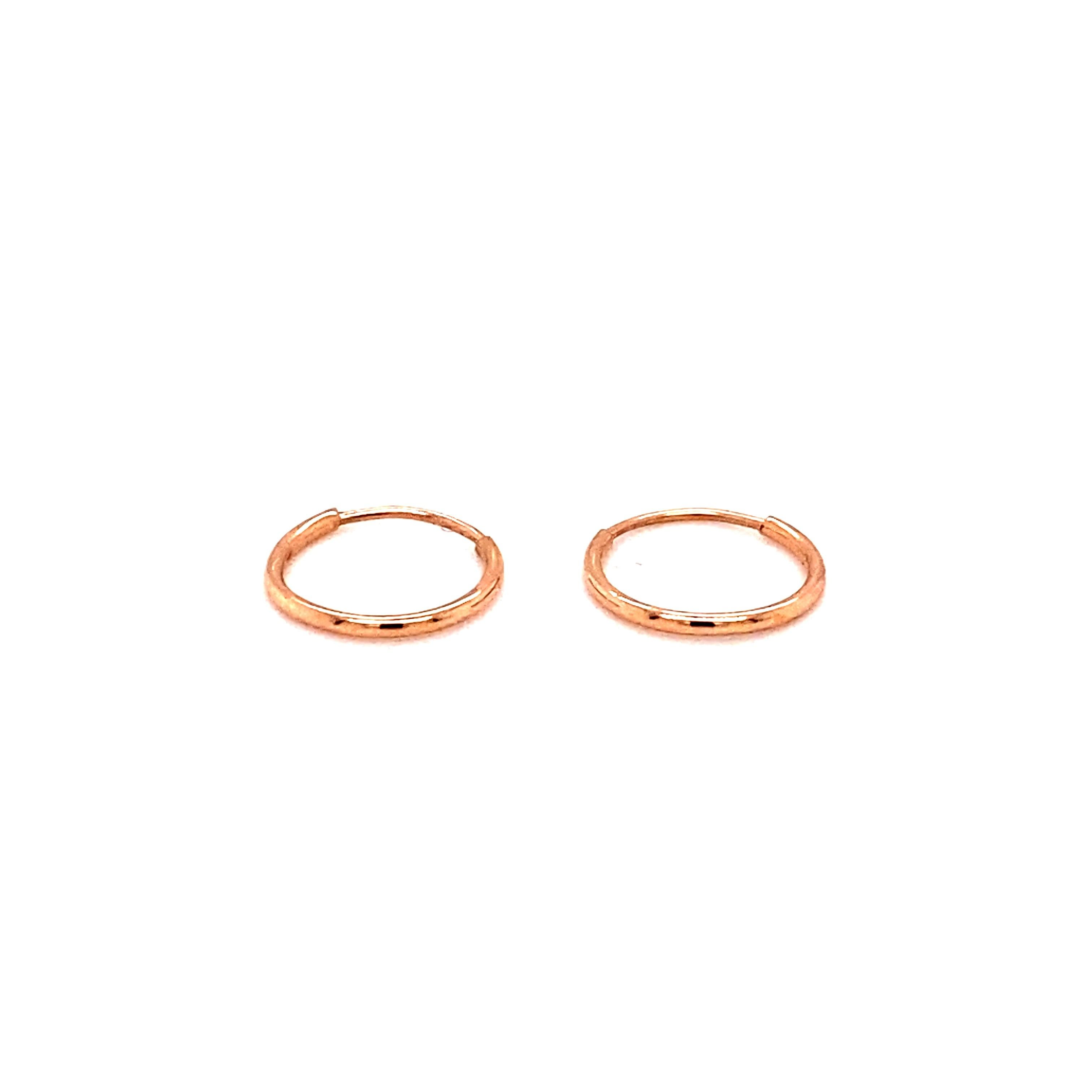 Modern Mini Hoop Earrings in 14 Karat Rose Gold For Sale