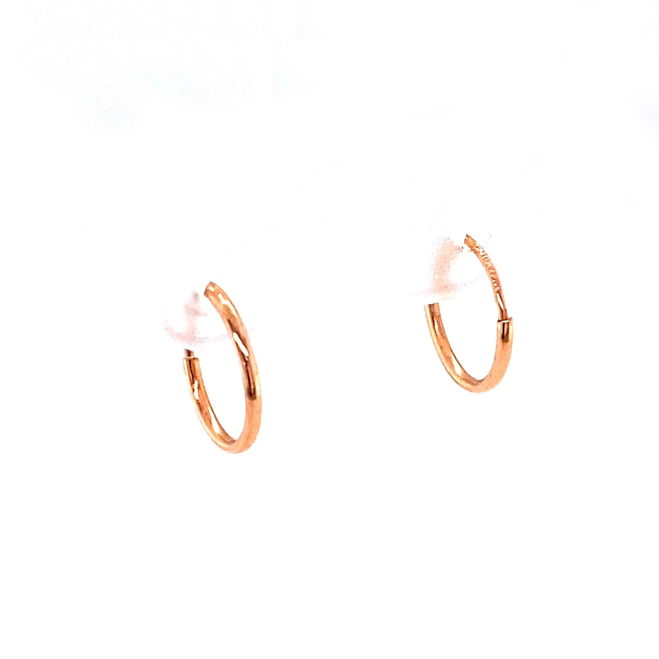 Mini Hoop Earrings in 14 Karat Rose Gold In Good Condition For Sale In Atlanta, GA