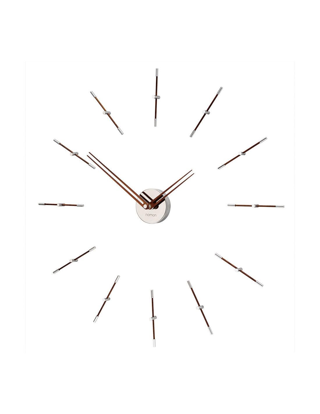 Die 12 N Mini Merlin-Uhr ist ein sehr vielseitiges und originelles Accessoire, das sich ideal zur Vervollständigung der Dekoration moderner Fußböden eignet, sowohl zu Hause als auch in Unternehmen oder Büros. Dieses Design ist elegant und bringt