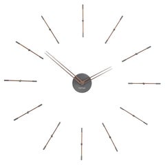 Mini horloge murale Merln 12 T en métal