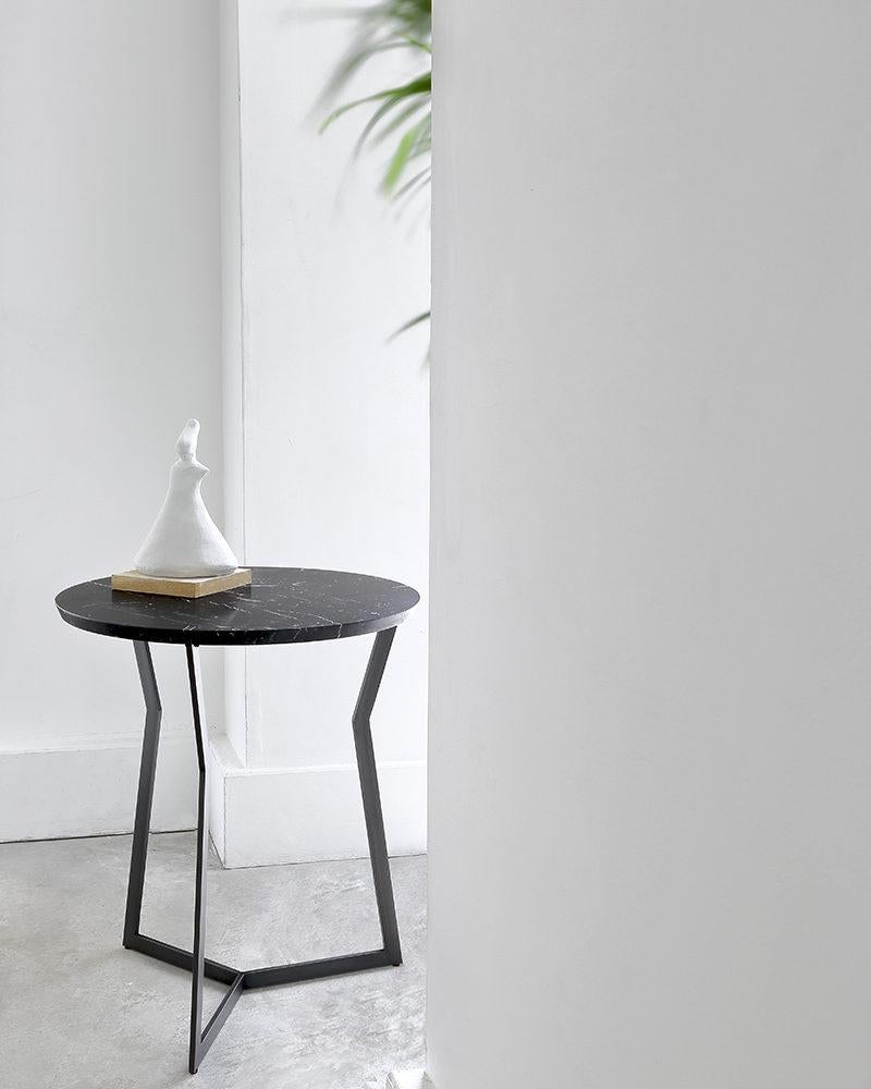 Mini Nero marble star side table by Olivier Gagnère
Materials: pedestal table, 20mm Carrara or Marquina marble top. Base in black bronze finishes lacquered metal.
Technique: lacquered metal, polished marble. 
Dimensions: diameter 40 x height 40