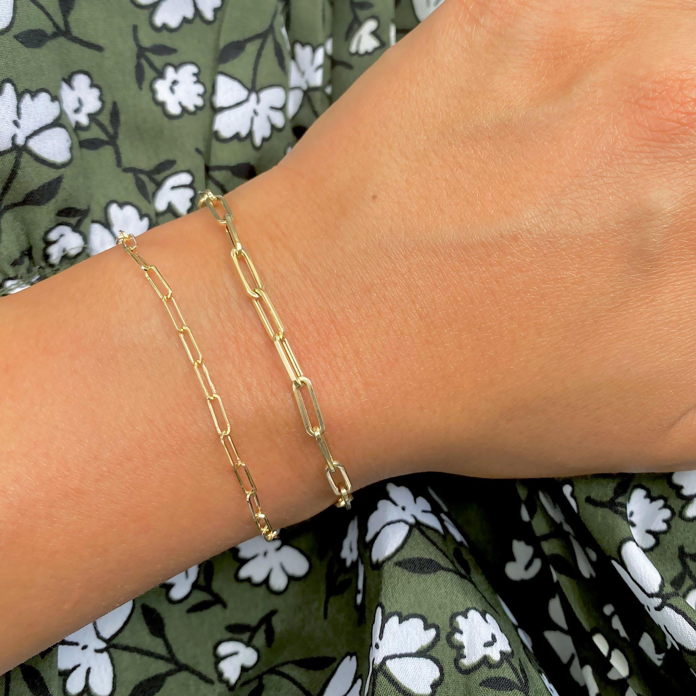 Bold, yet simple, this paperclip link chain bracelet works well on its own, with a charm or as part of a layered ensemble!

14K Semi-Hollow Italian Yellow Gold
Length: 7 inches or clasp it through any link for a shorter length
Each link is