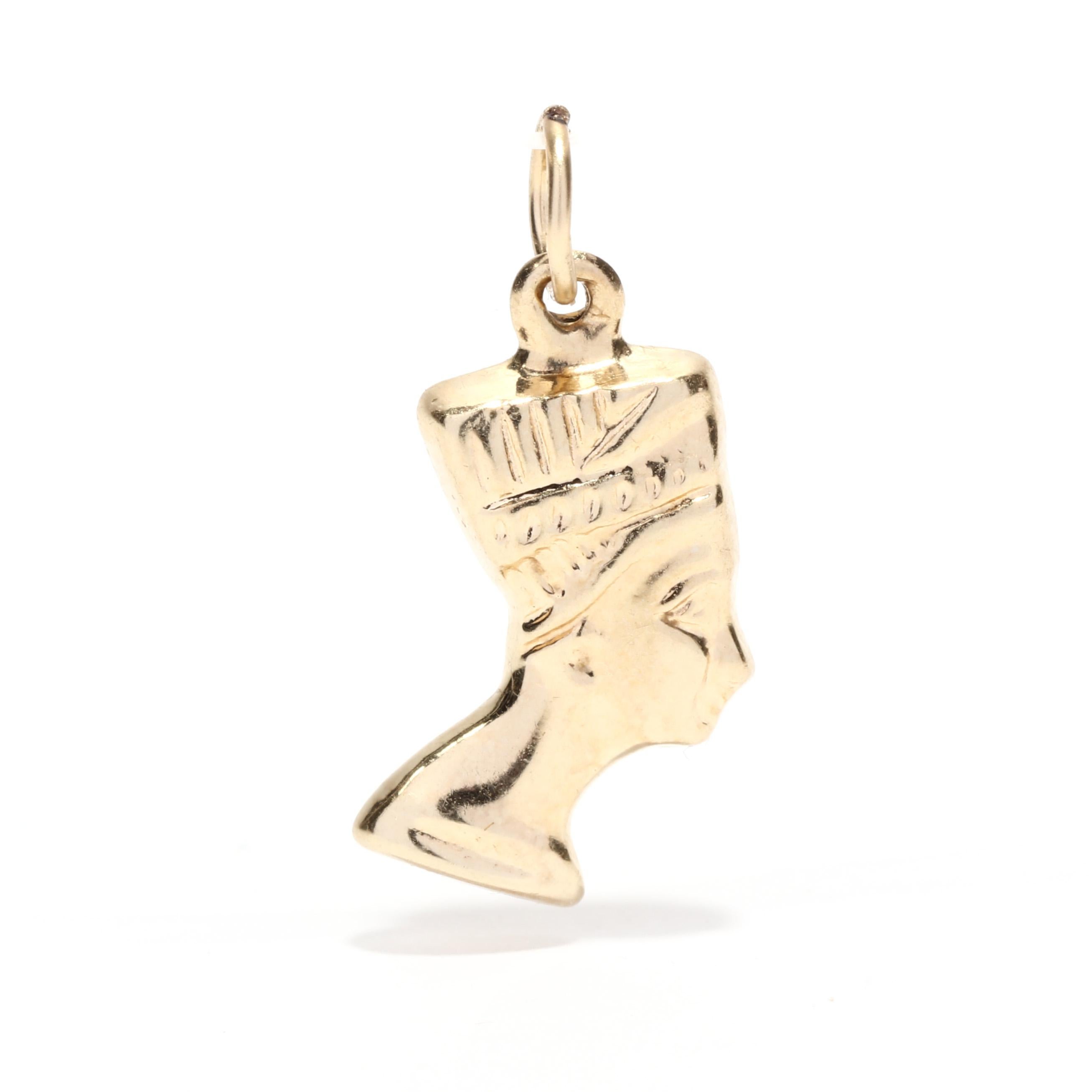 A vintage 14 karat yellow gold mini pharaoh head charm. This Egyptian travel charm features a puff Pharaoh head suspended from a thin bail.

Length: 3/4 in.

Width: 1/4 in.

Weight: .3 dwts. / .47 grams

Metal: 14K (tested)

Ring Sizings &